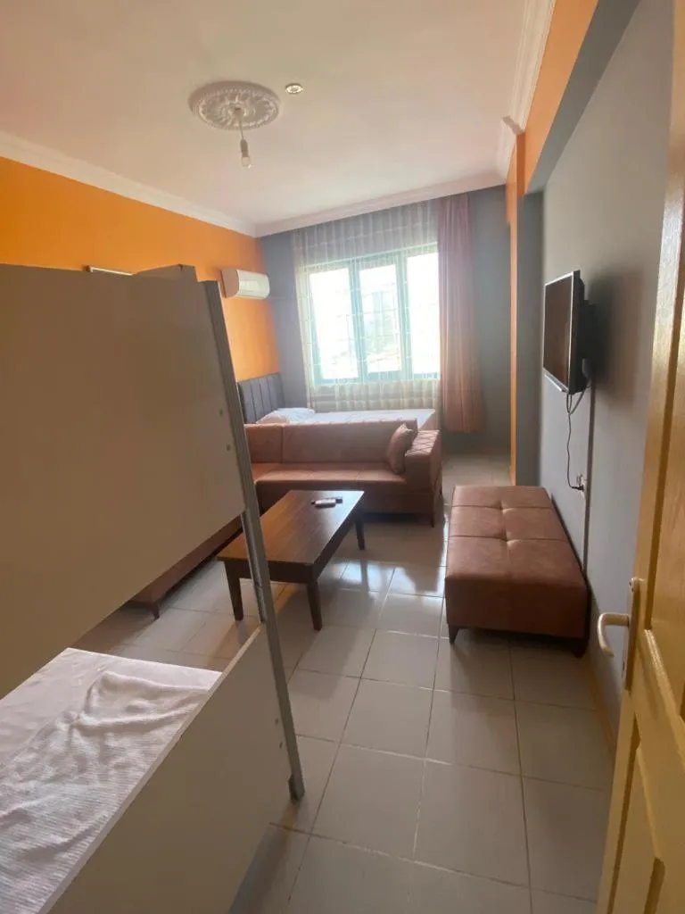 Seating area, Bed in City House Hotel