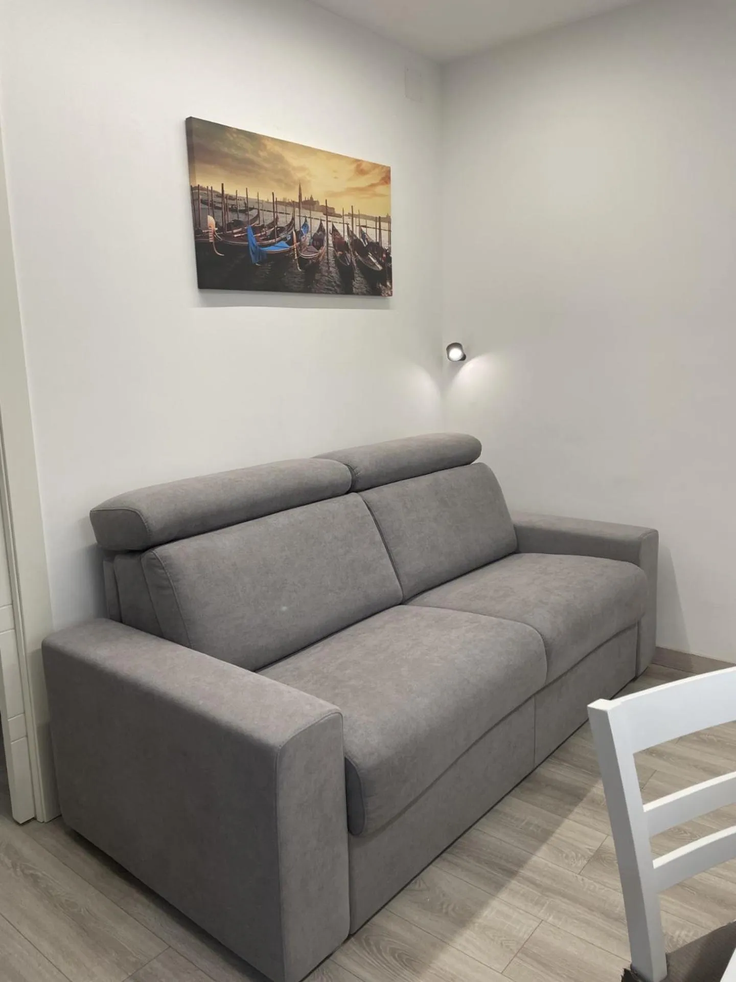 Communal lounge/ TV room in Bnb apartment Ferrara