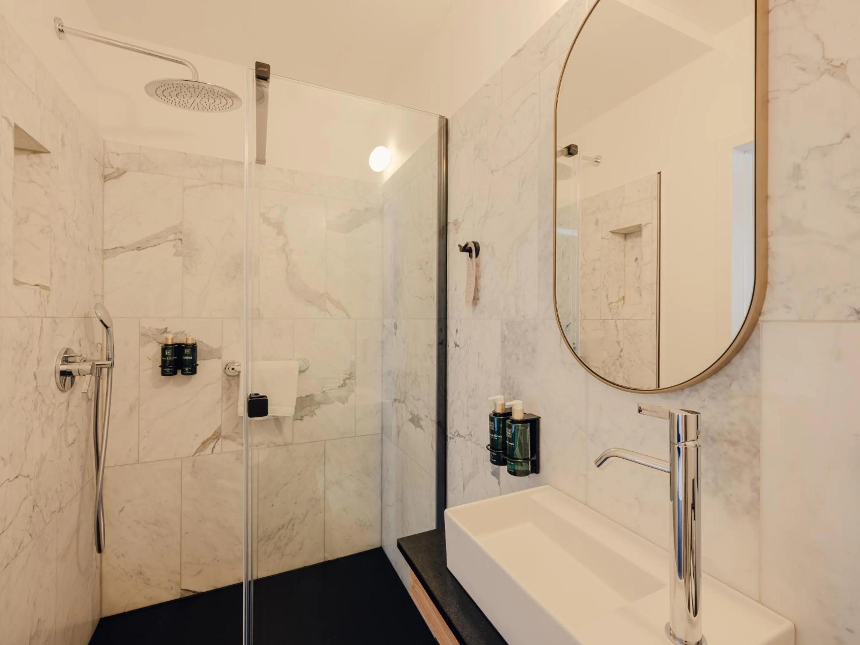 Bathroom in Flaner Hotel, WorldHotels Crafted