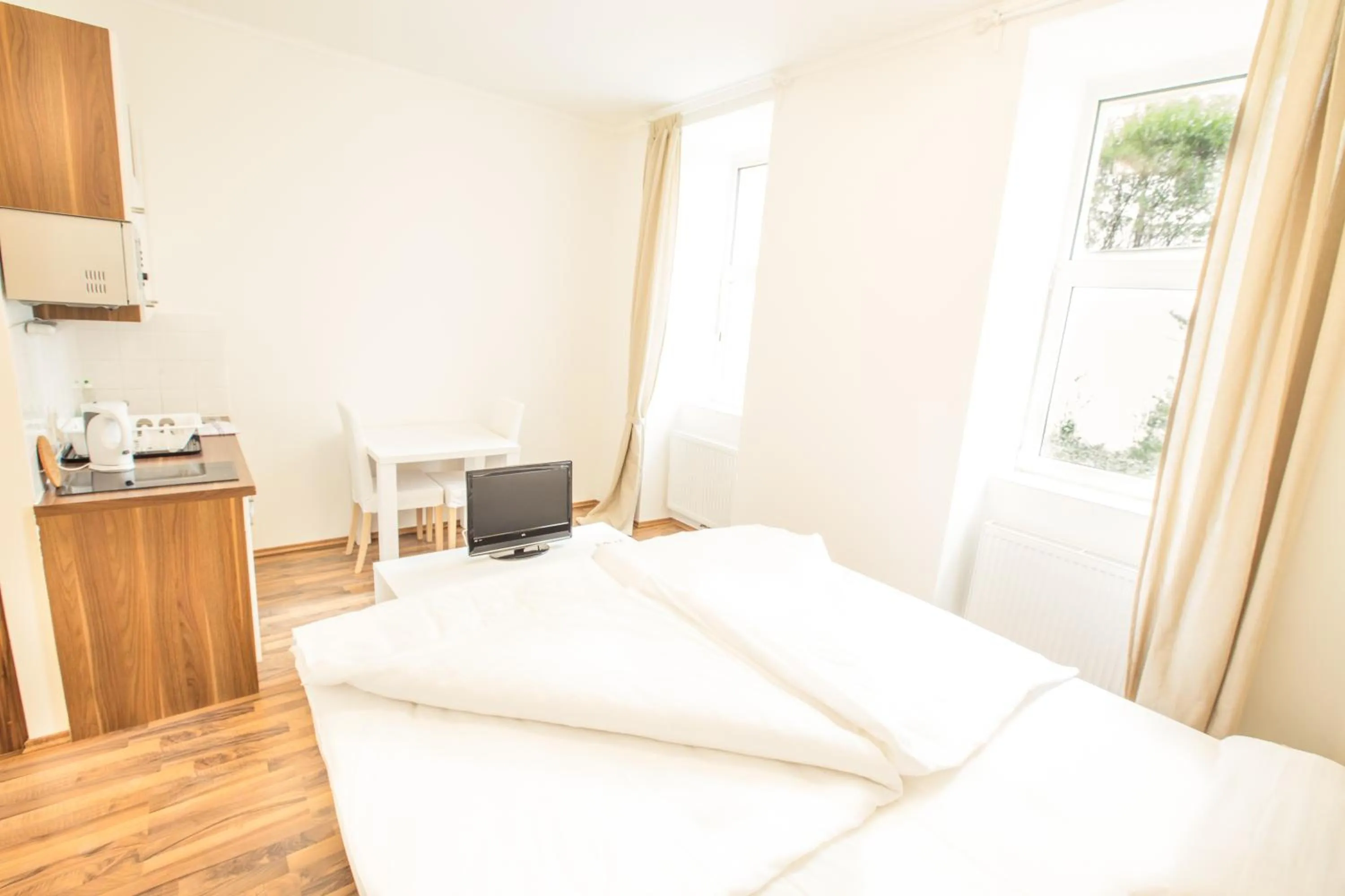 Bedroom in Grand Central Station Apartments I contactless check-in