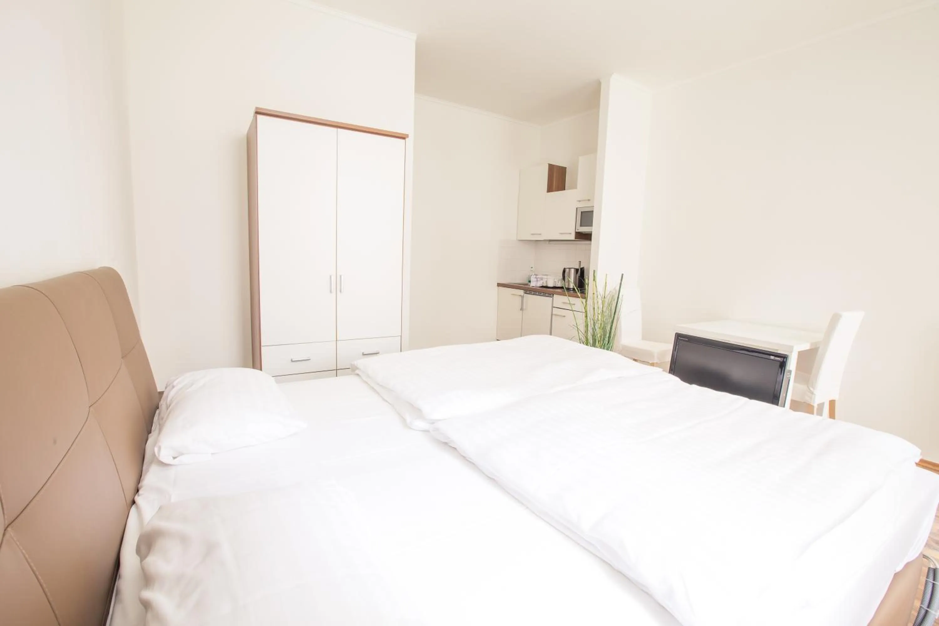 Bedroom in Grand Central Station Apartments I contactless check-in