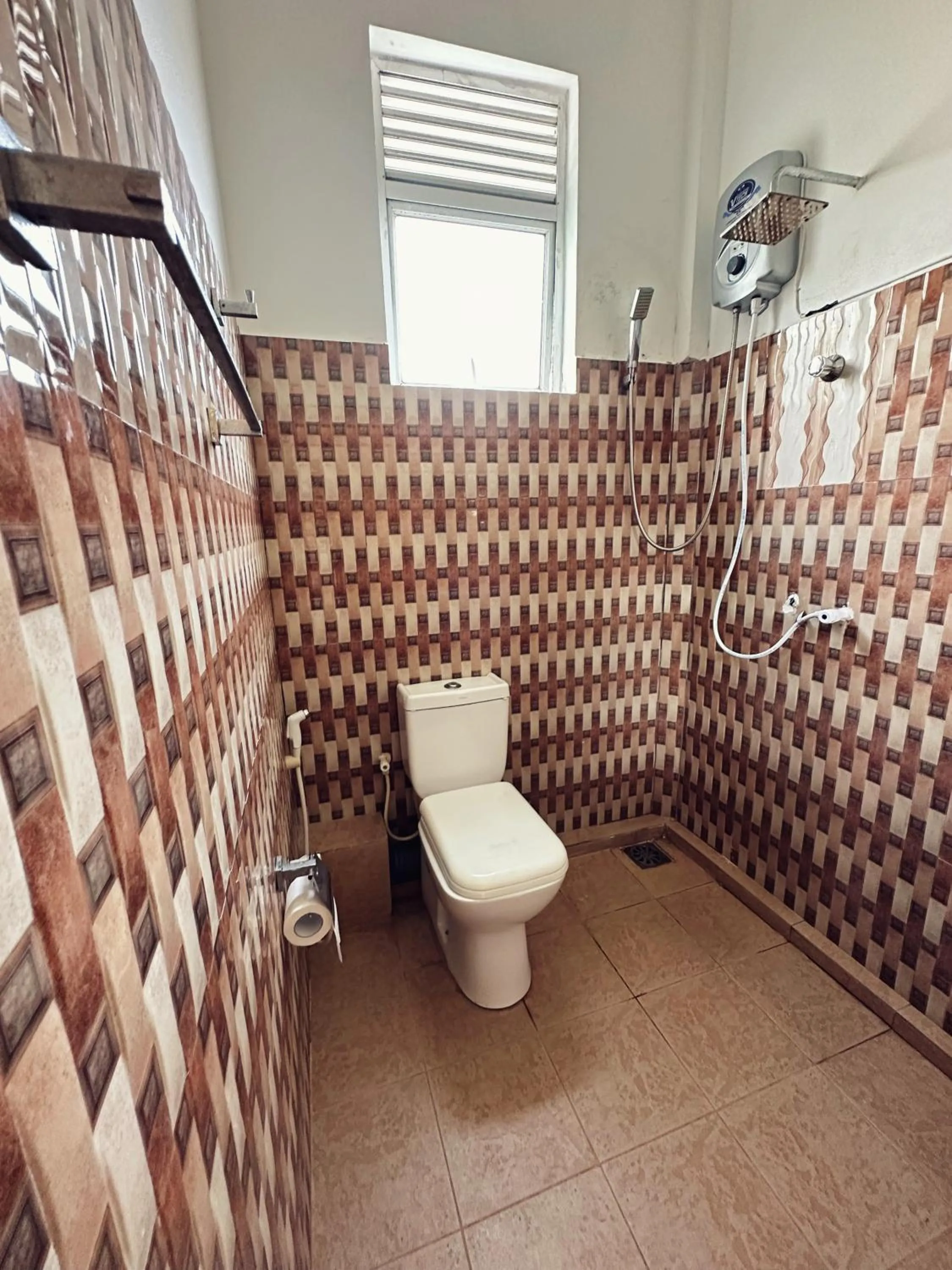 Bathroom in New Golden Bay Resort Weligama