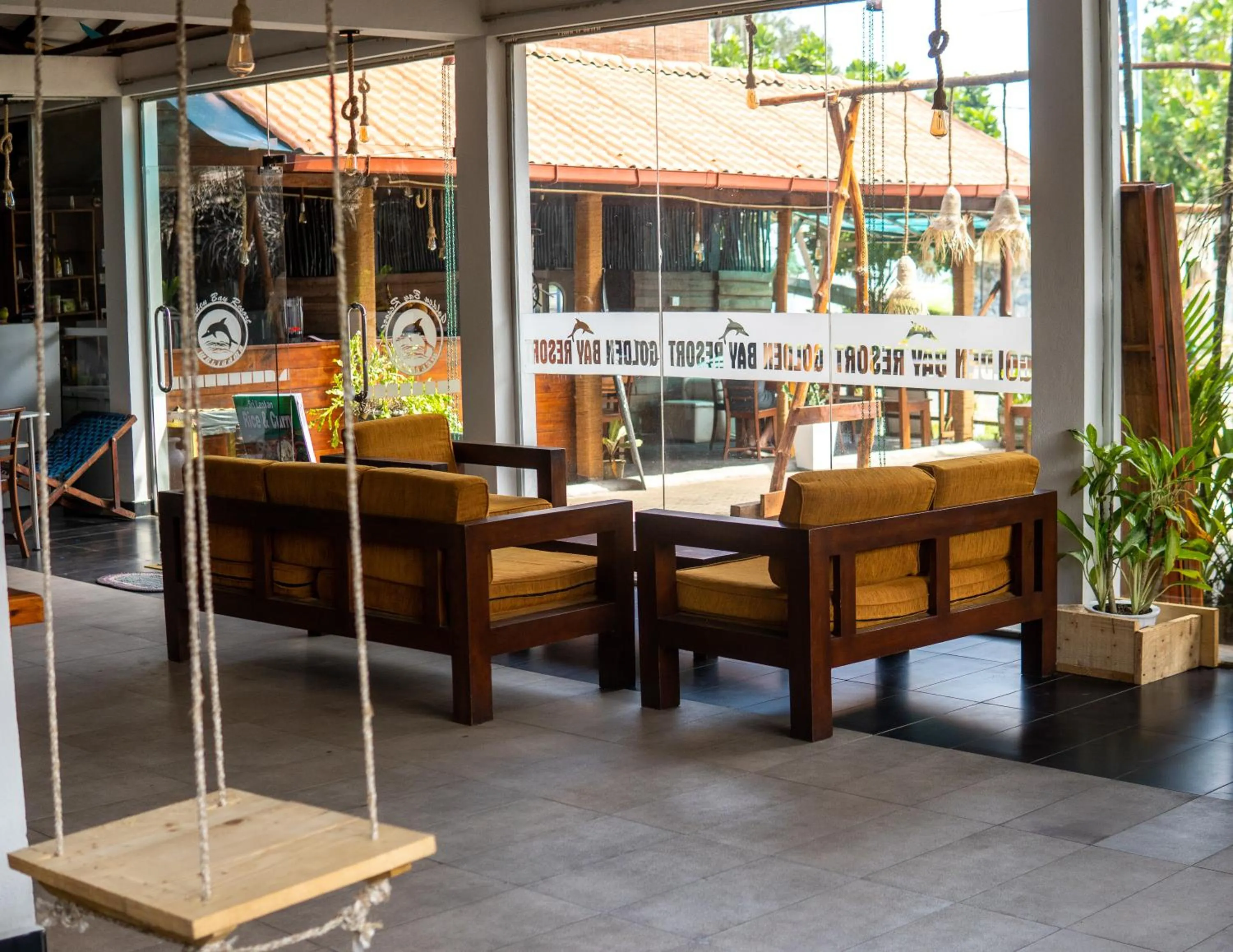 Seating area in New Golden Bay Resort Weligama