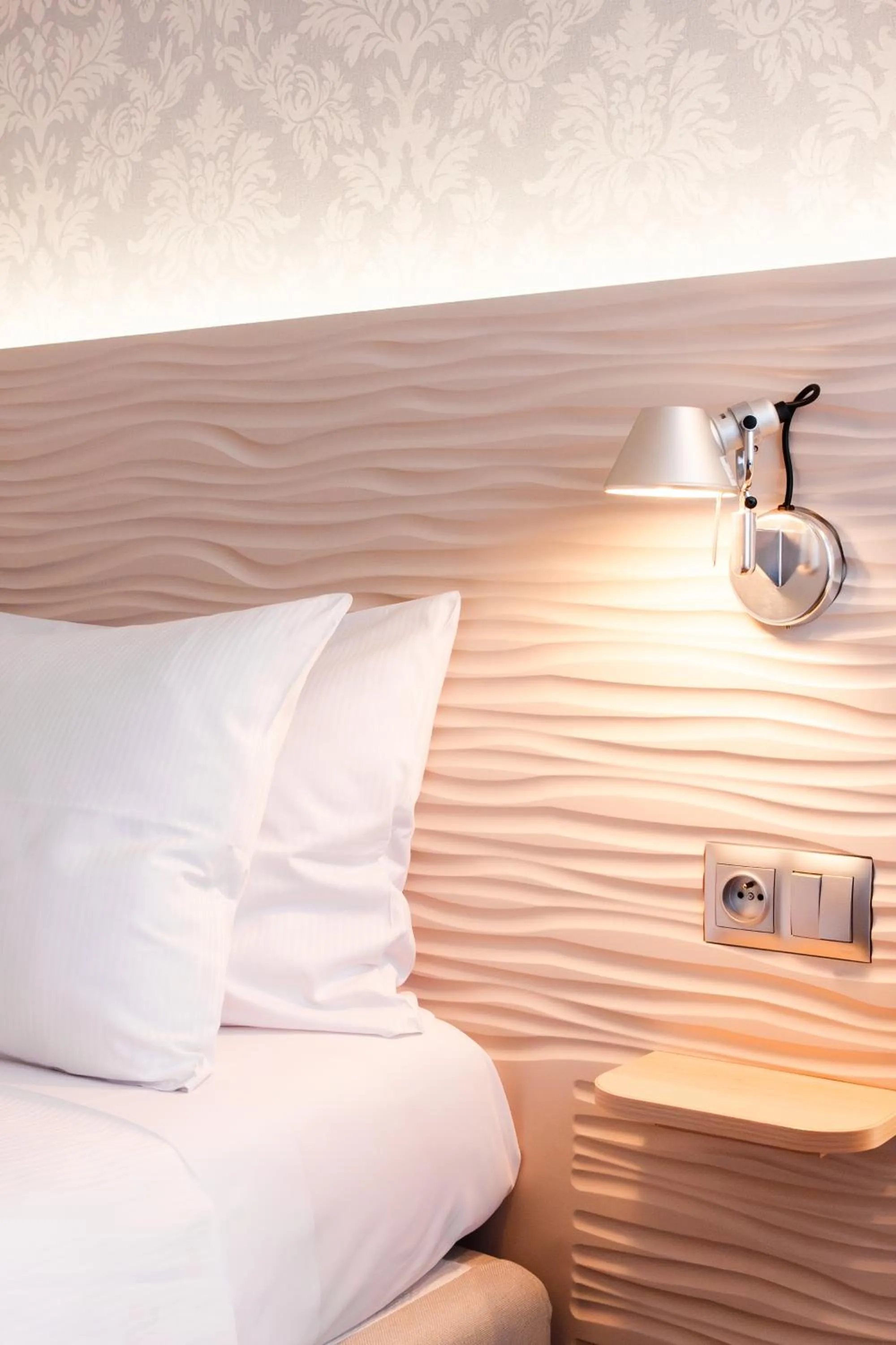 Bed in Hotel Metropol