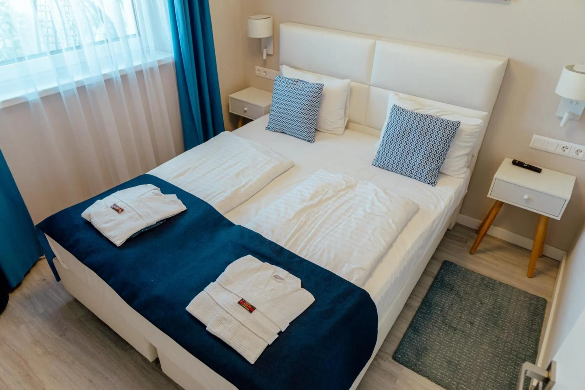 Bed in Lake Spirit Boutique Apartments