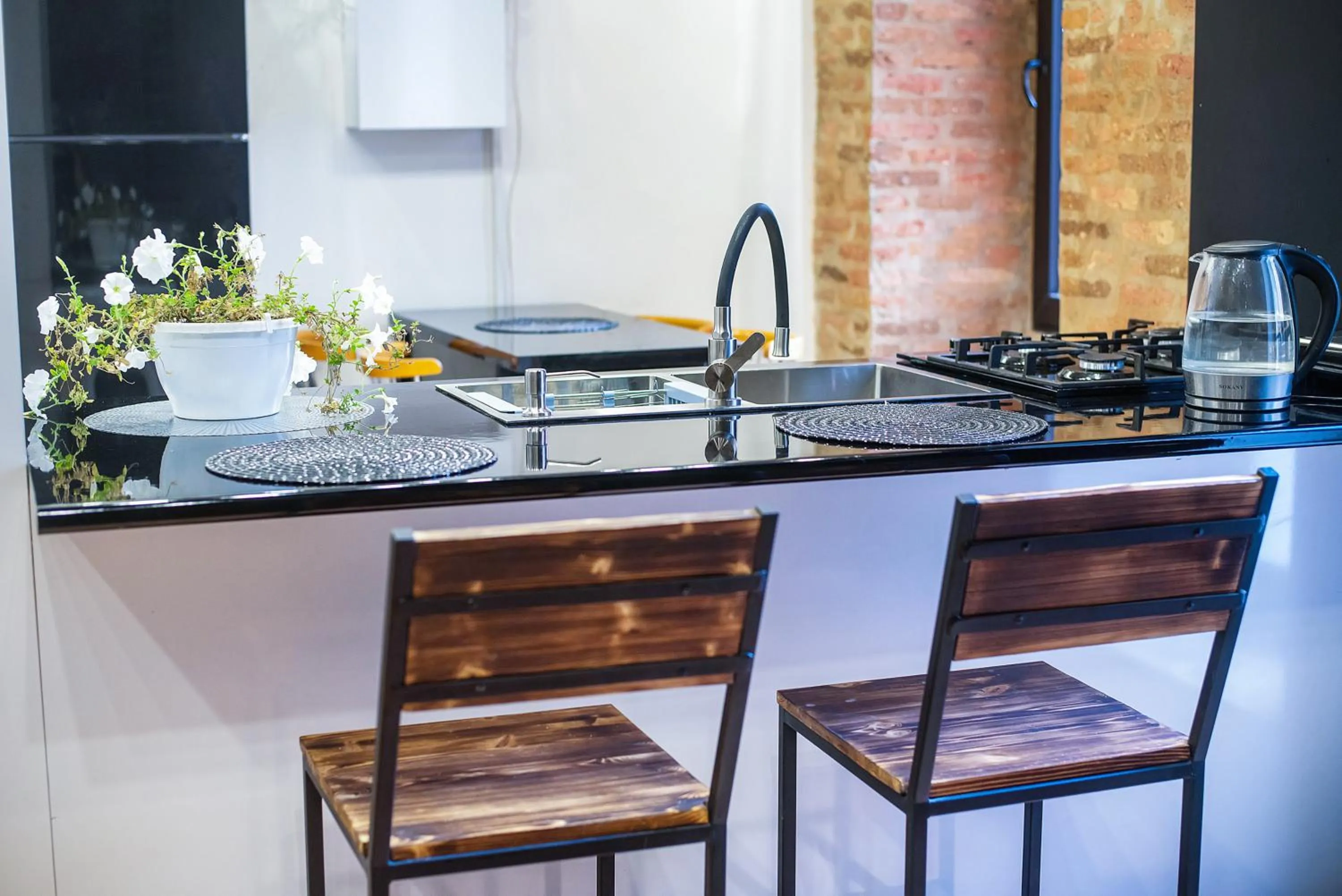 Kitchen or kitchenette in HB apartments Aghmashenebeli