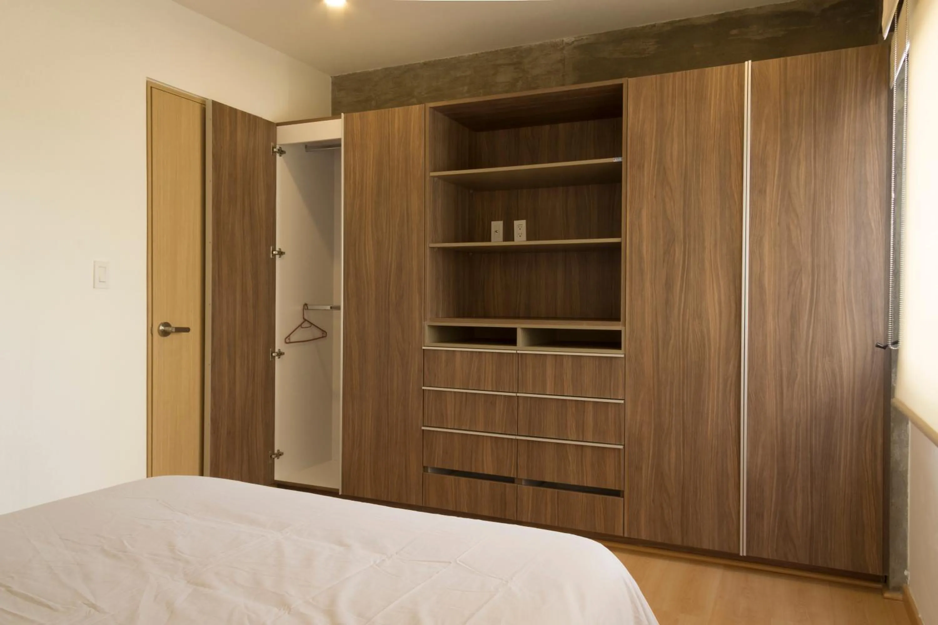 wardrobe, Bed in El Doce by HomiRent