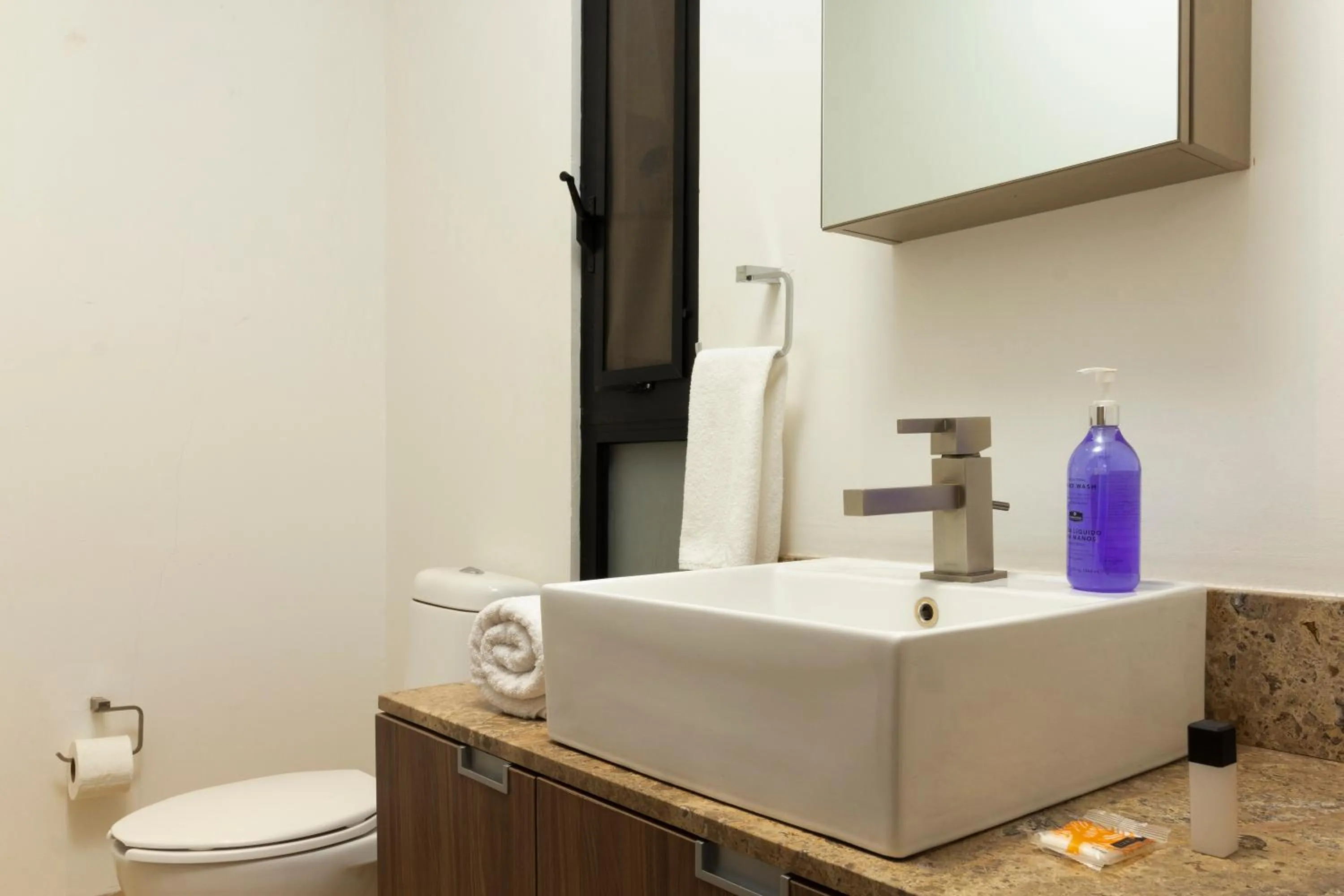 Bathroom in El Doce by HomiRent