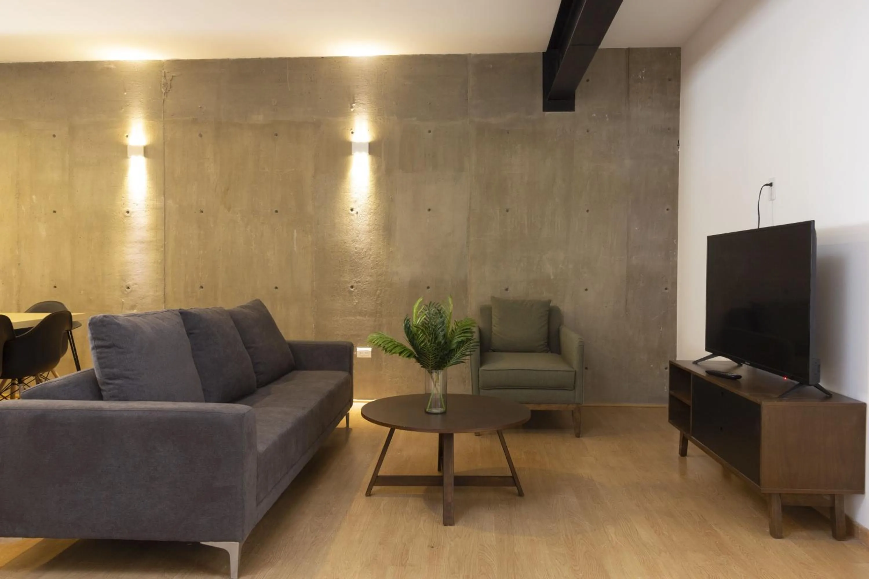 Living room in El Doce by HomiRent