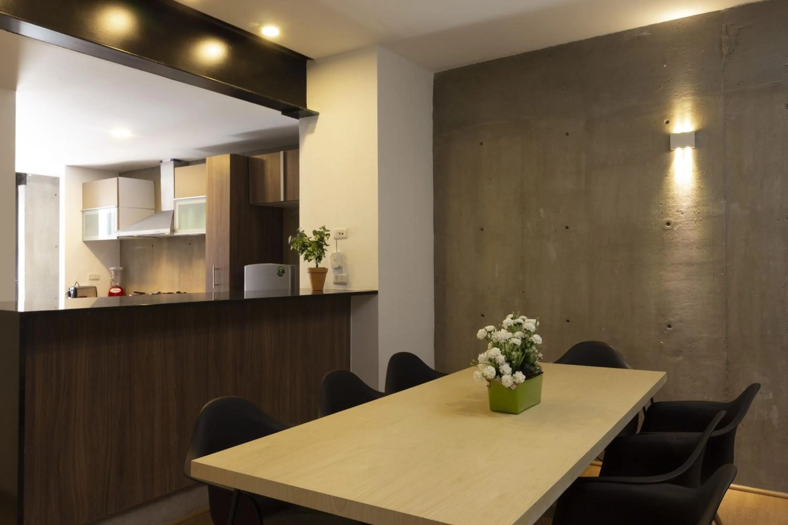 Dining area in El Doce by HomiRent