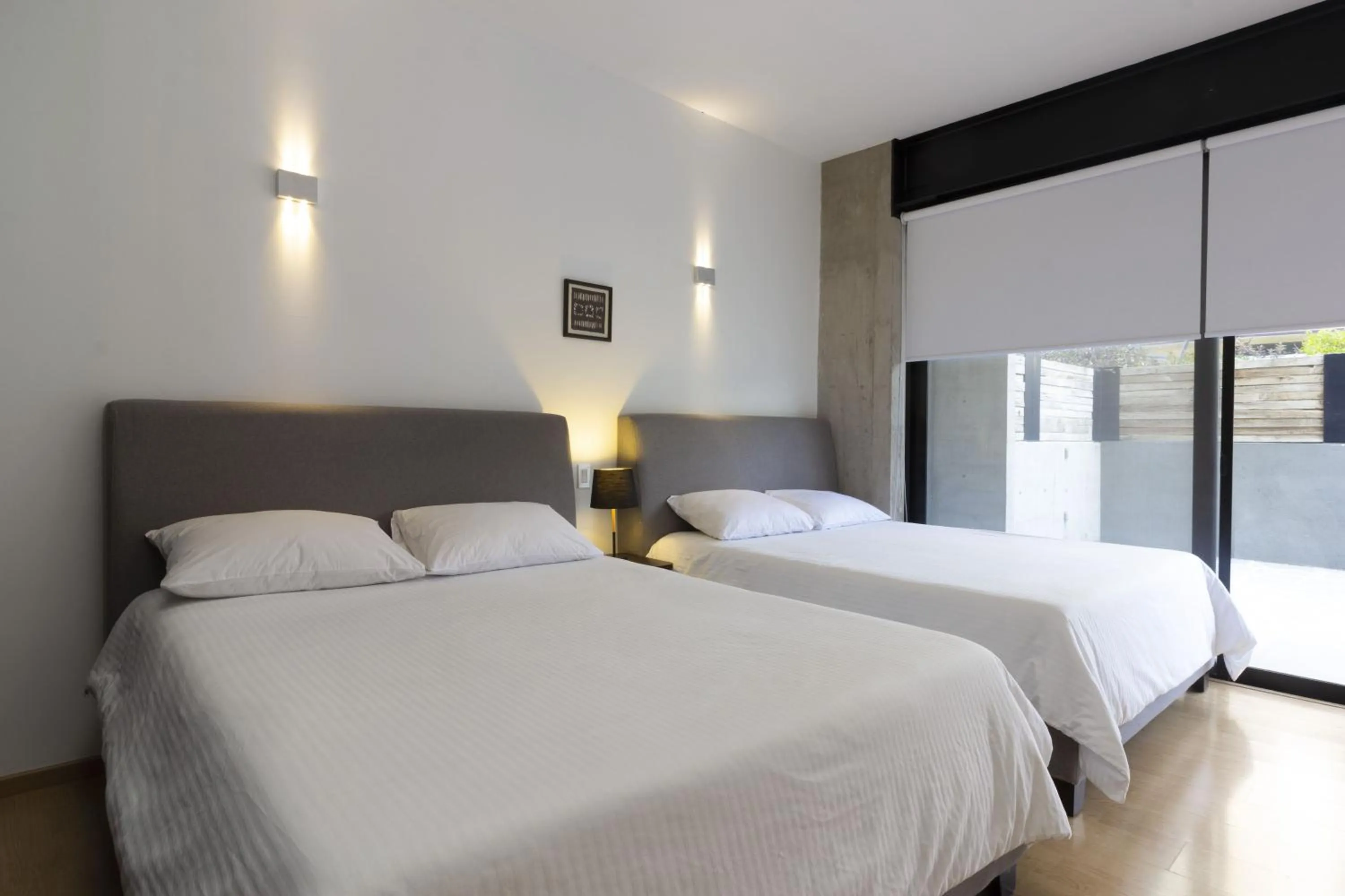 Photo of the whole room, Bed in El Doce by HomiRent