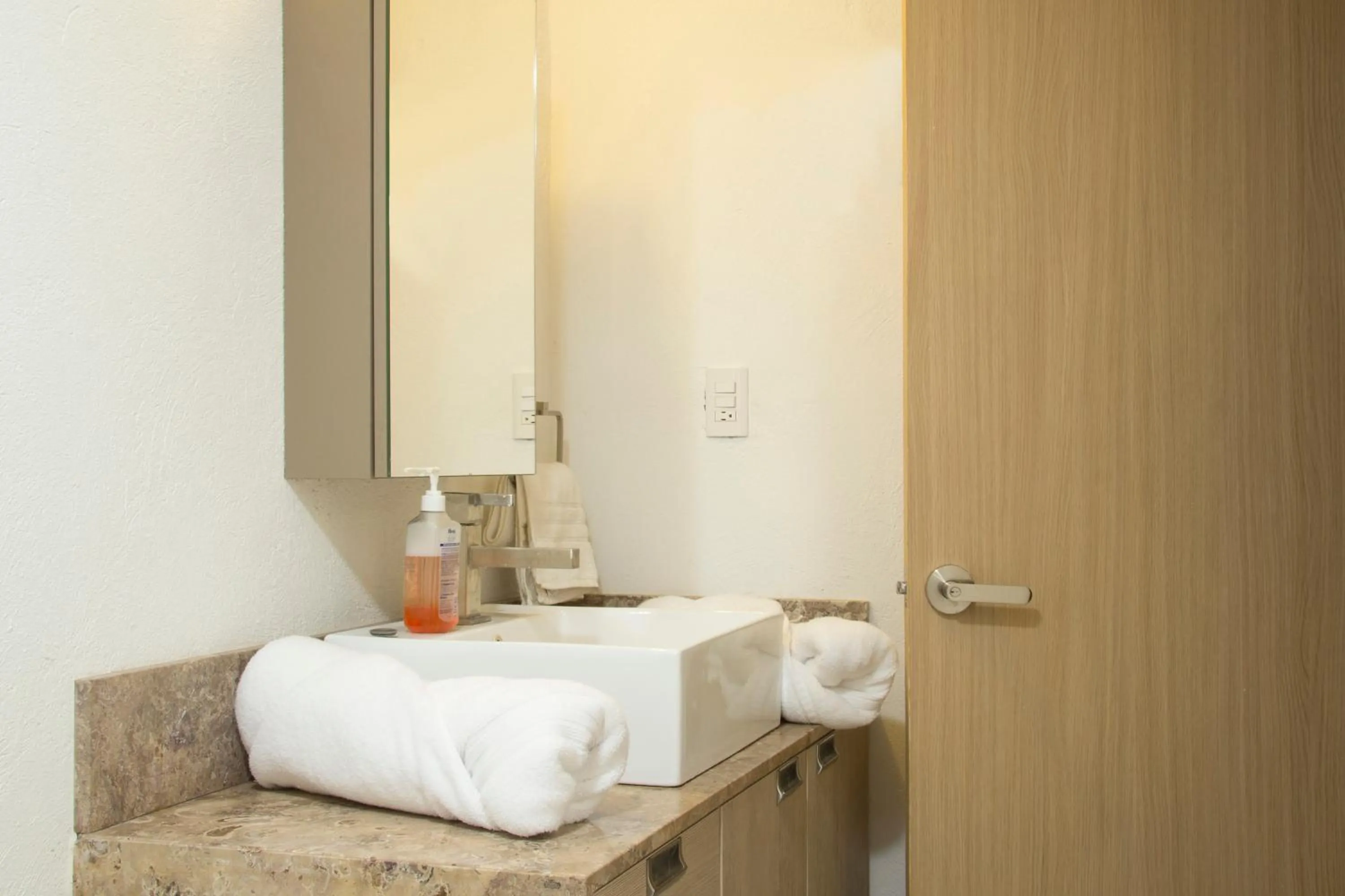 Bathroom in El Doce by HomiRent