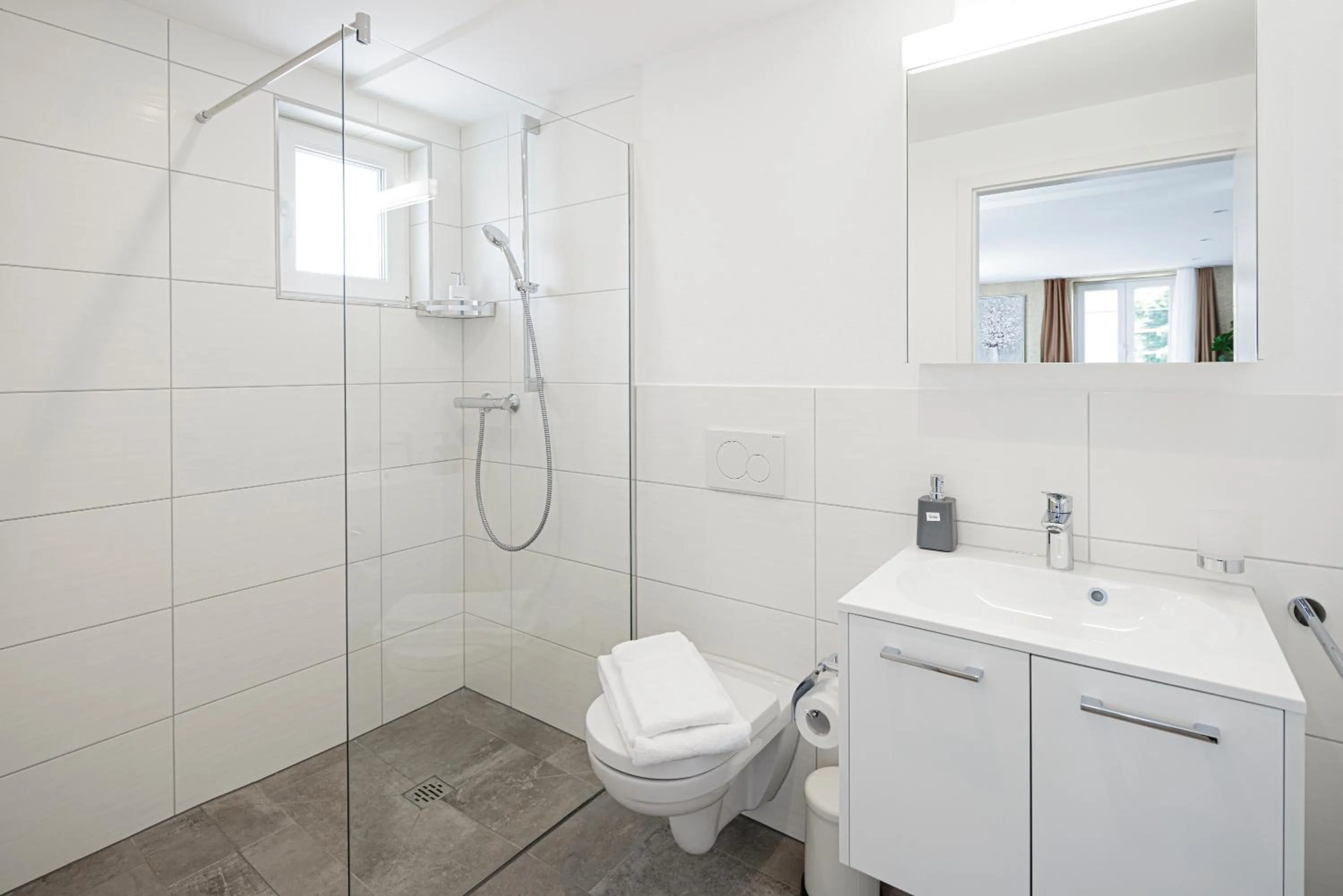 Bathroom in VISIMO Apartments Steigerstrasse St Gallen - Modern Living near OLMA & Hospital
