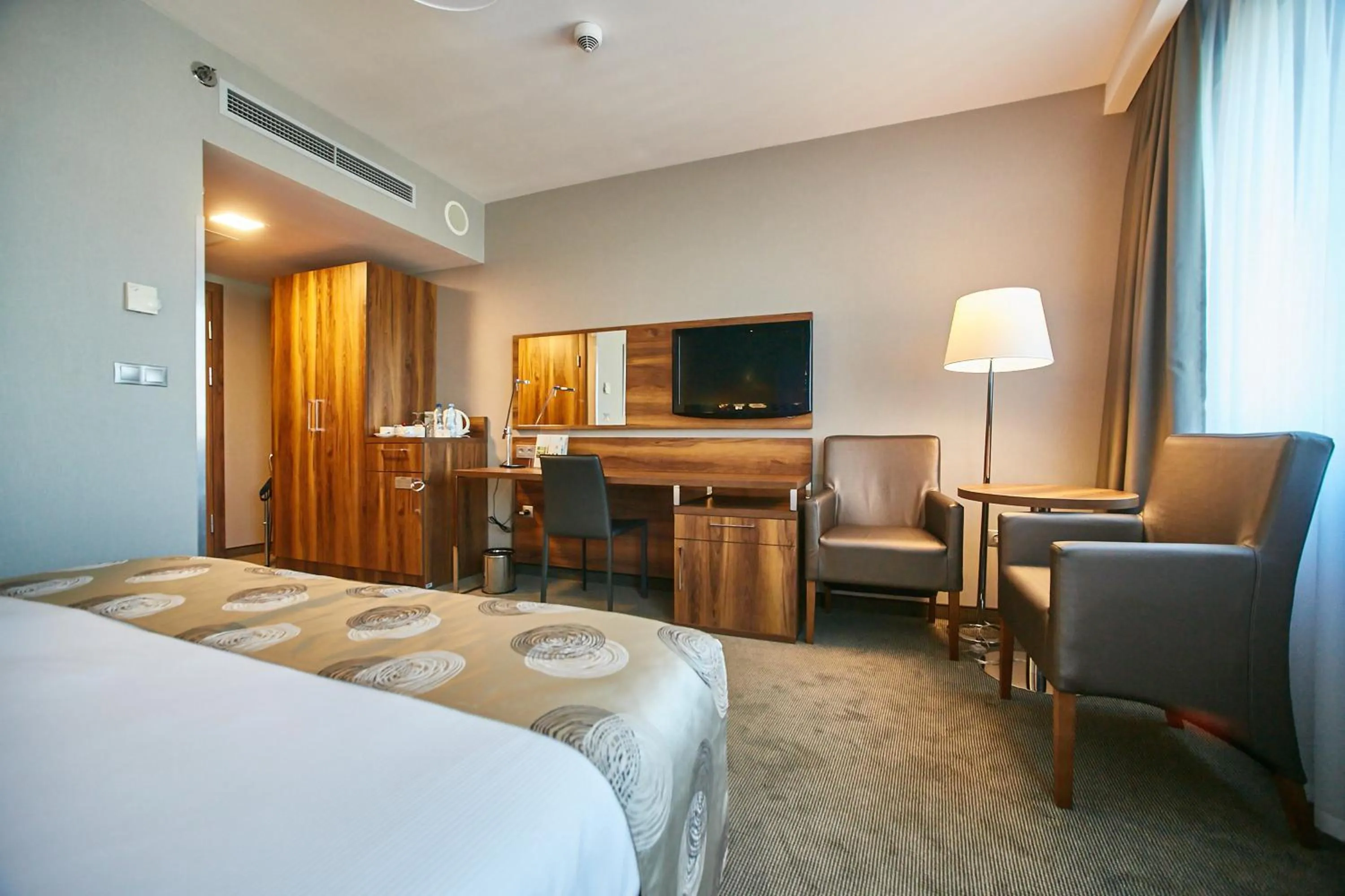 Photo of the whole room, Bed in Holiday Inn Krakow City Centre by IHG