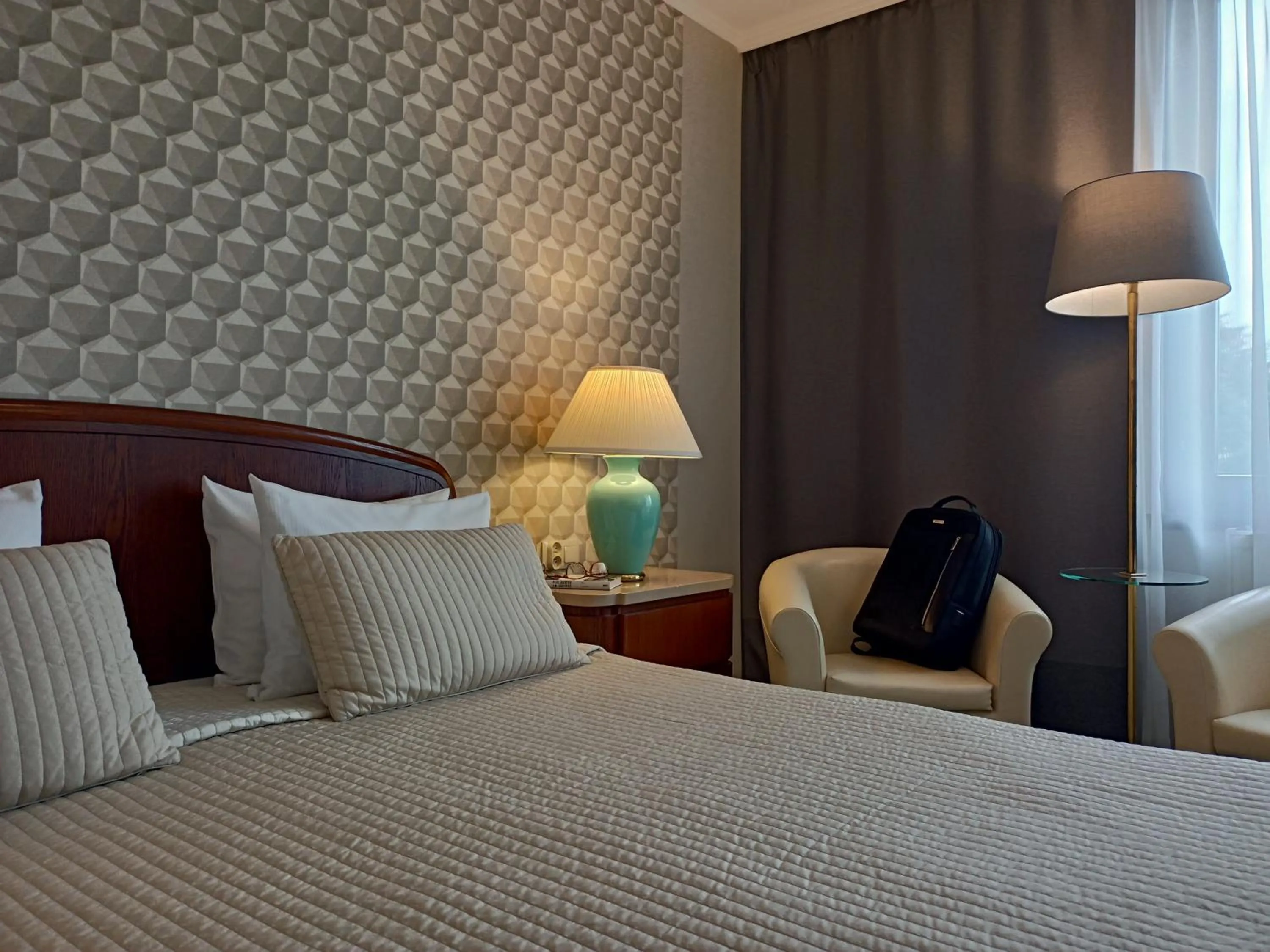 Bed in Booking Hotel & Spa