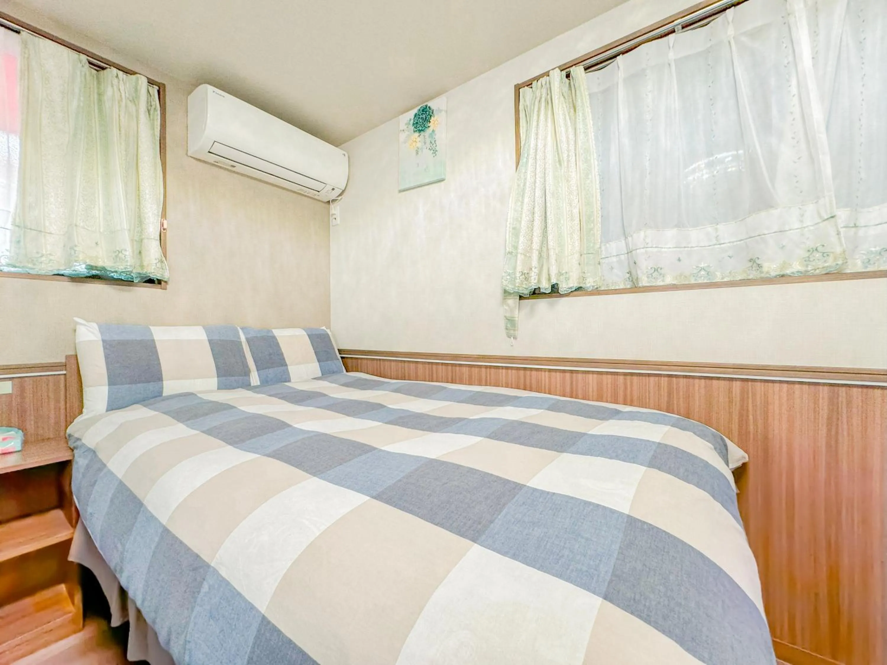 Bed in SHINJUKU WARM VILLA I