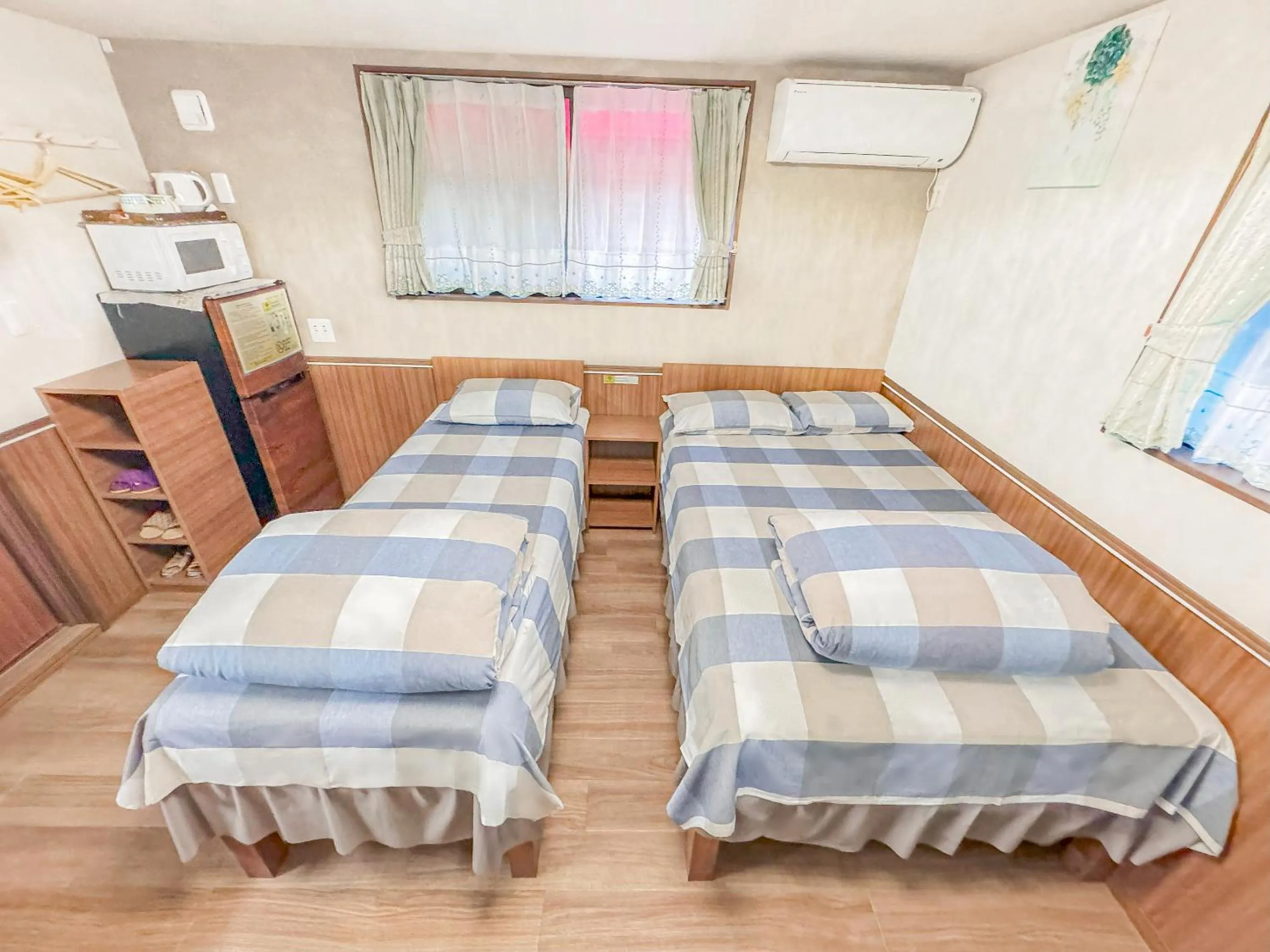 Bed in SHINJUKU WARM VILLA I