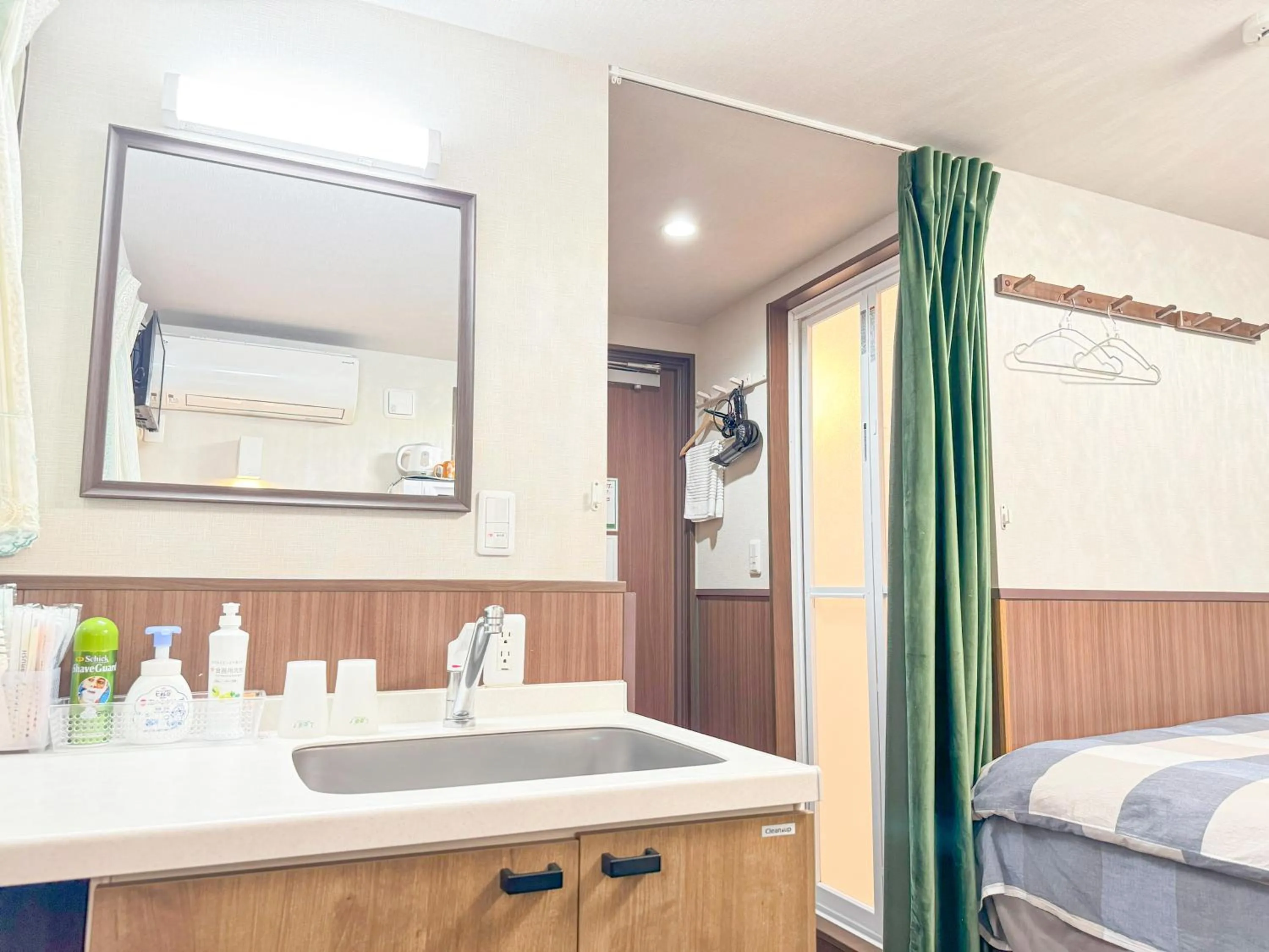 Bed in SHINJUKU WARM VILLA I