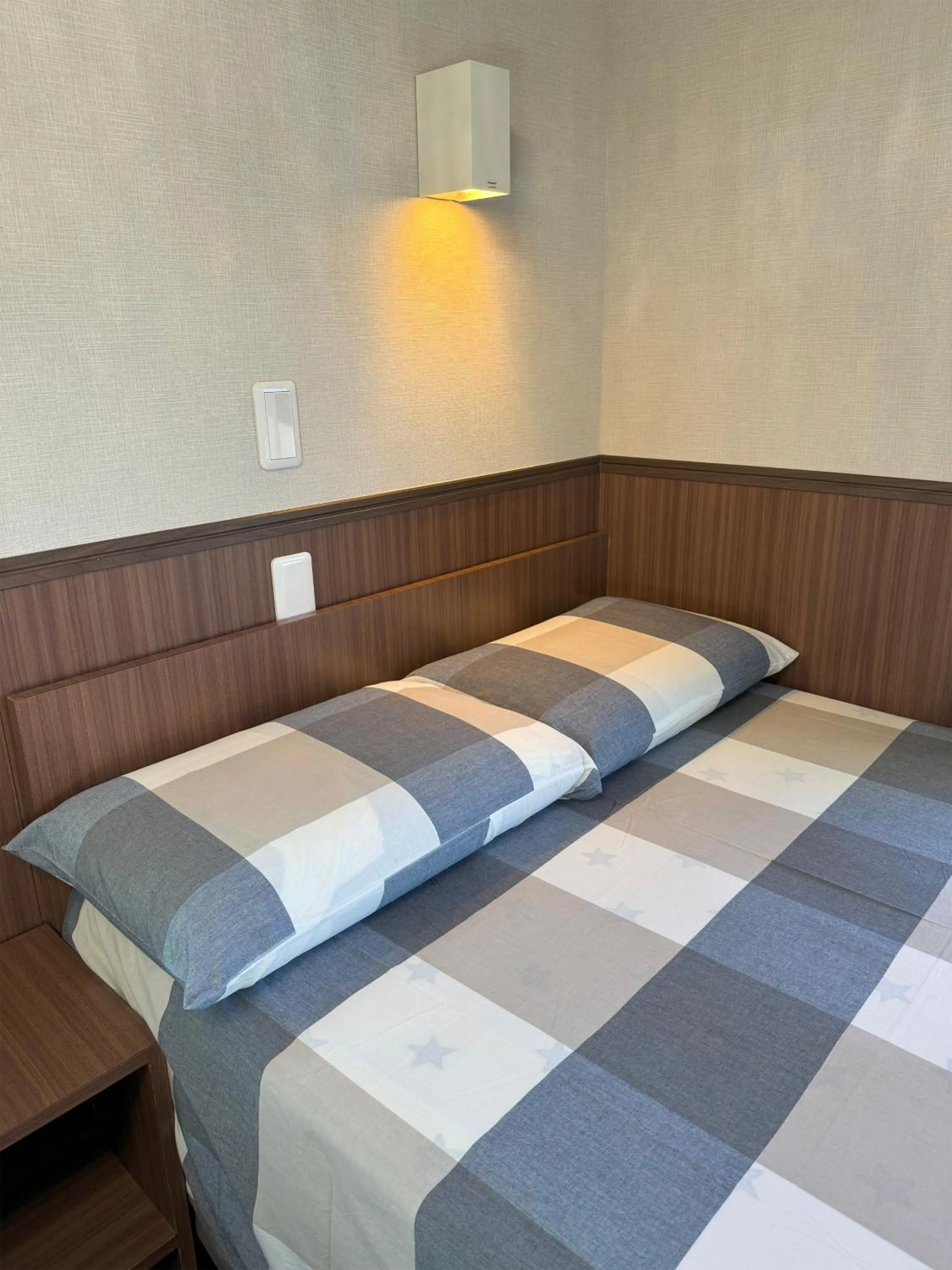 Bed in SHINJUKU WARM VILLA I