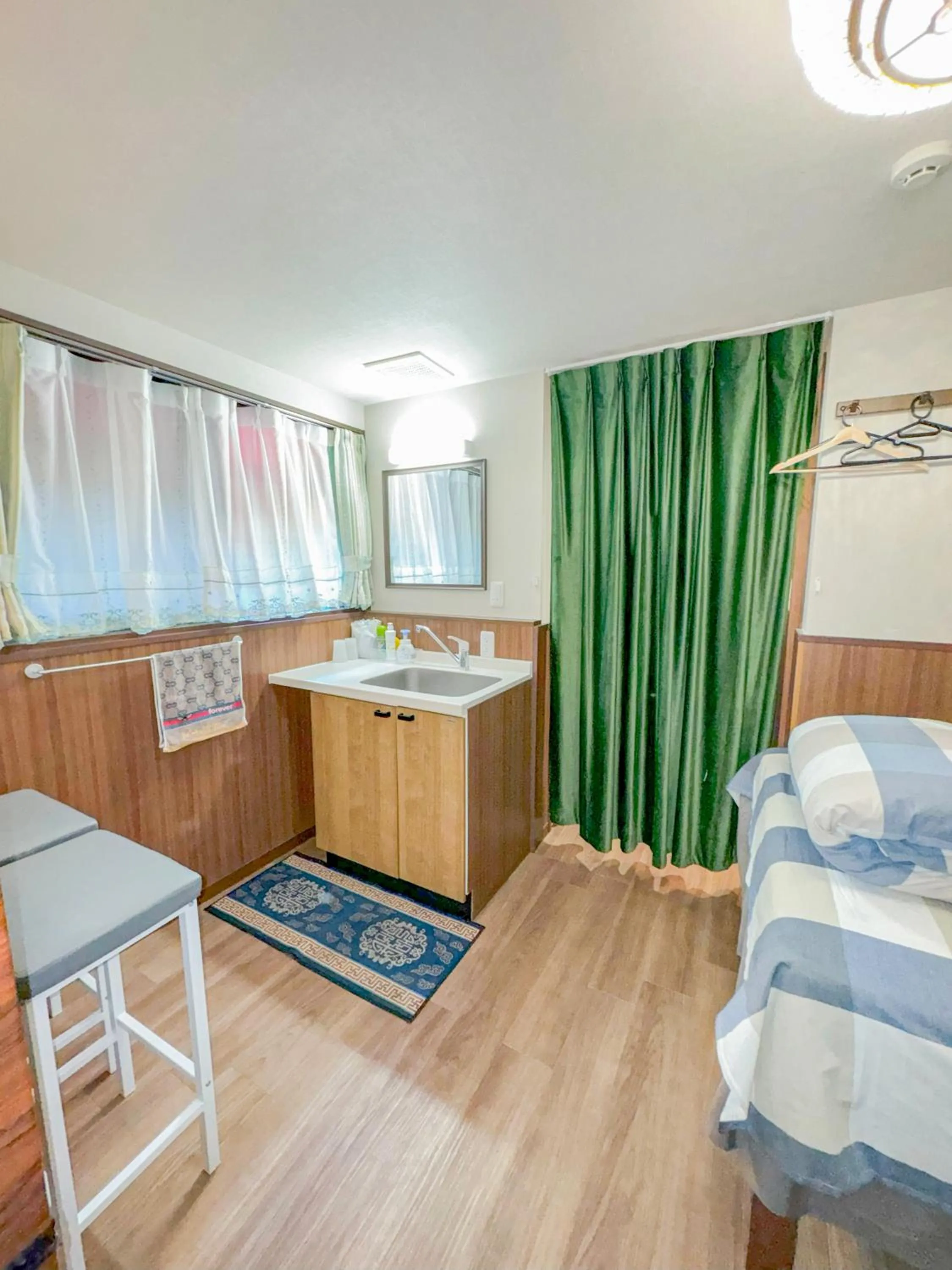 Bed in SHINJUKU WARM VILLA I