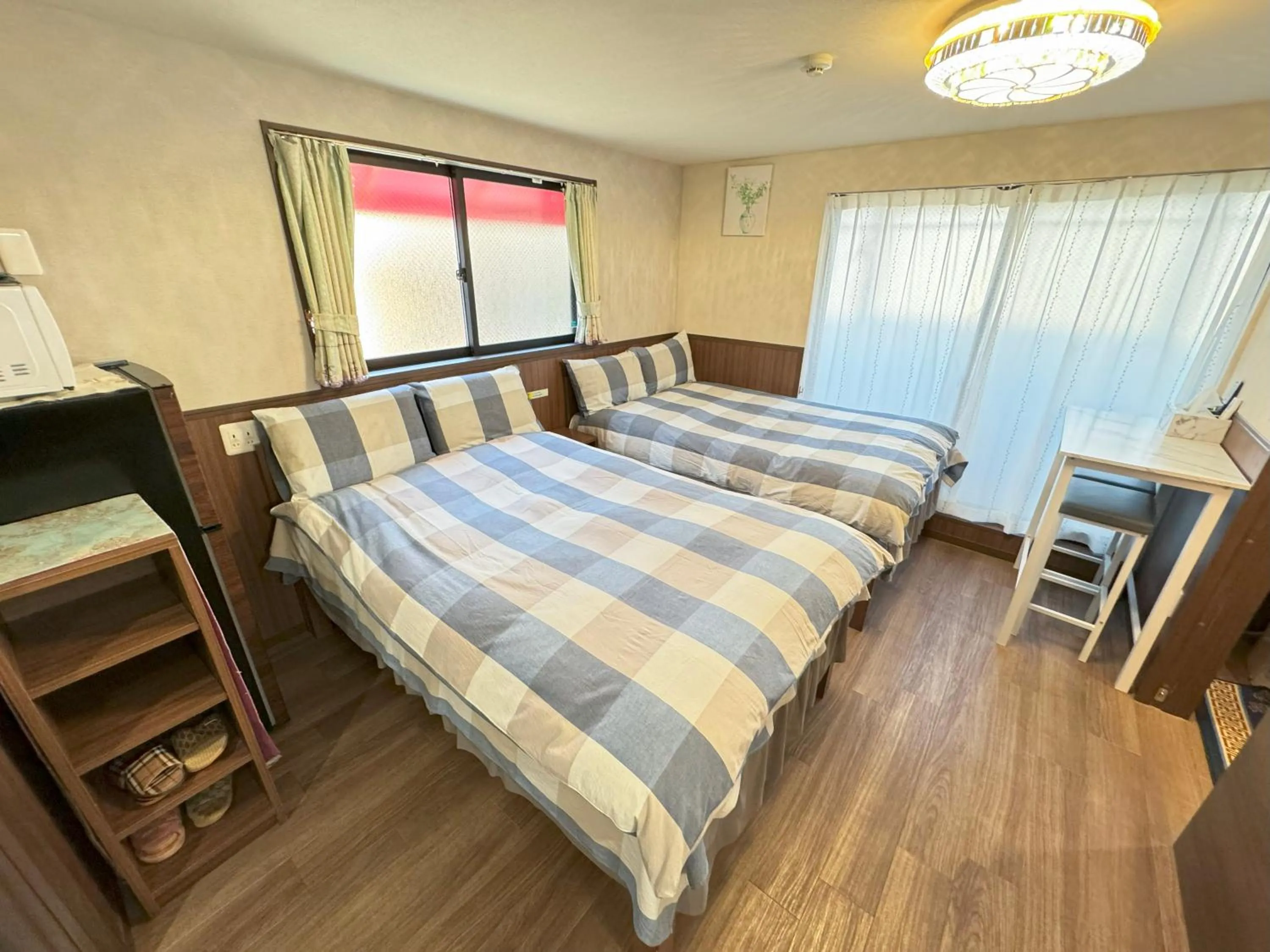 Bed in SHINJUKU WARM VILLA I