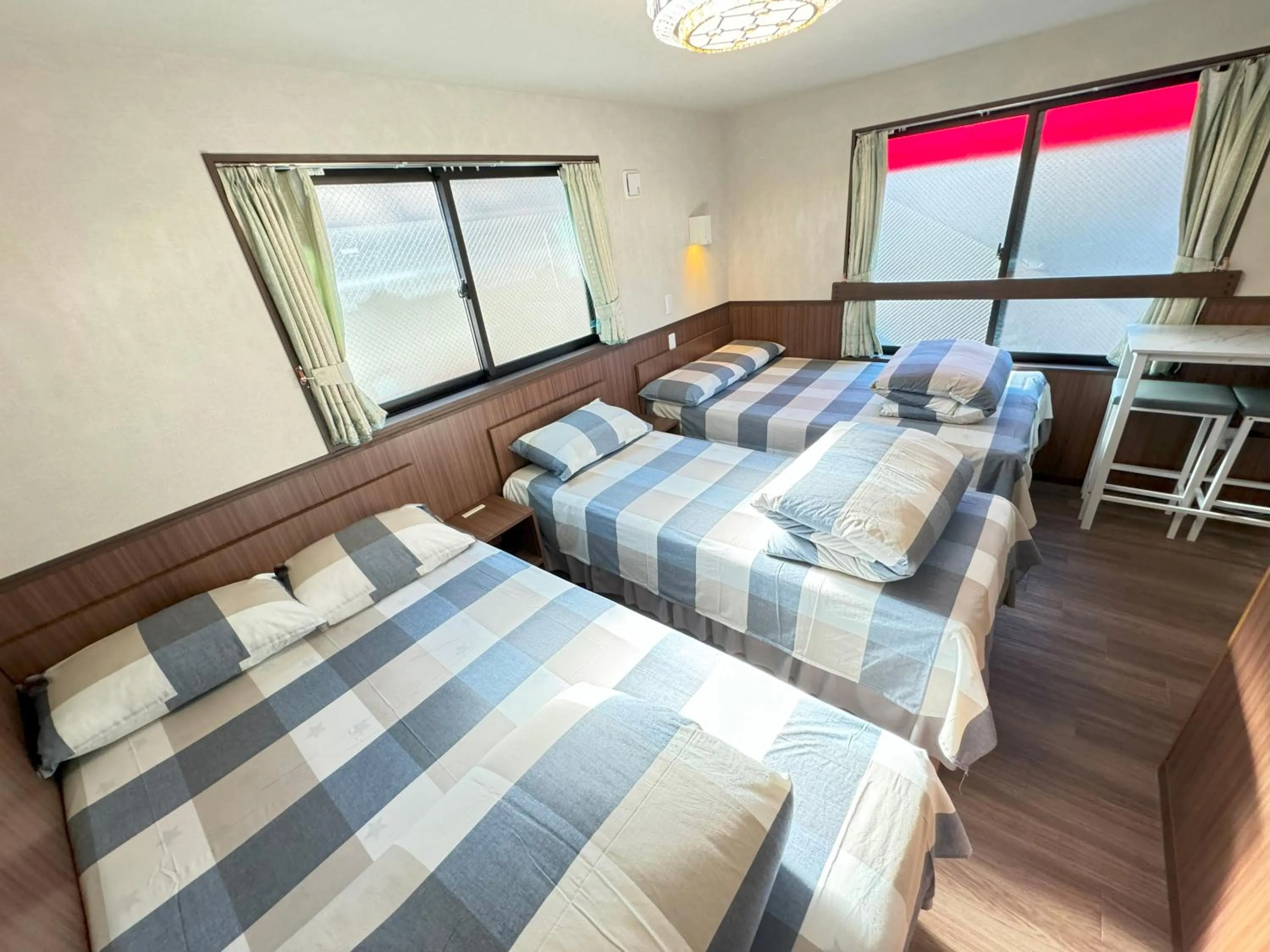 Bed in SHINJUKU WARM VILLA I