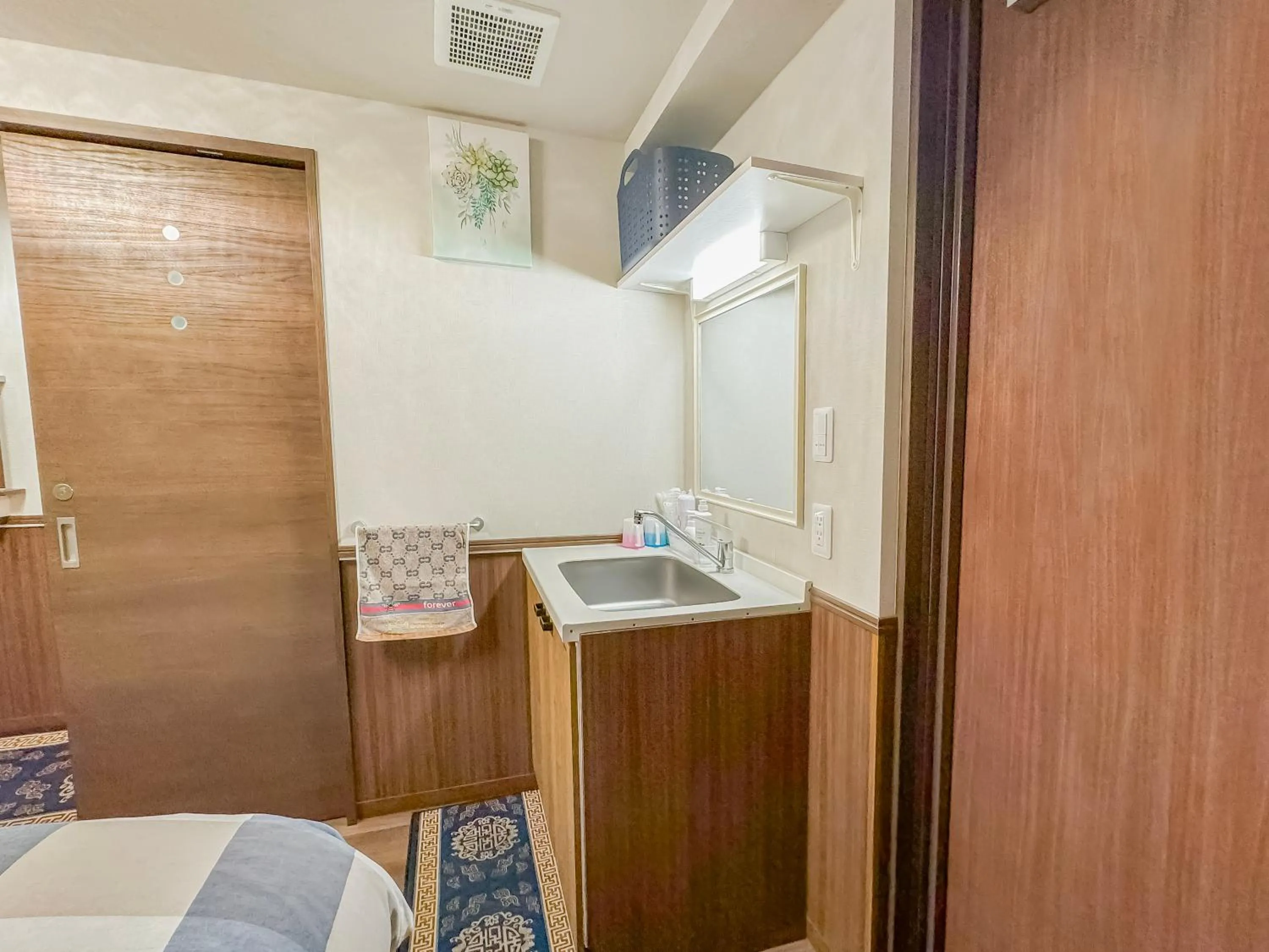 Bed in SHINJUKU WARM VILLA I