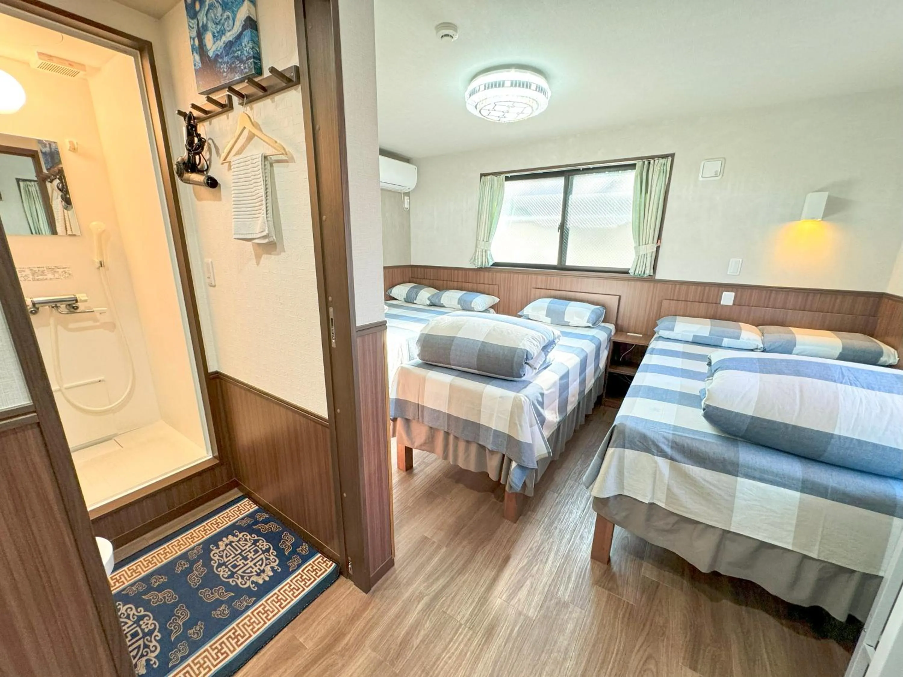 Bed in SHINJUKU WARM VILLA I