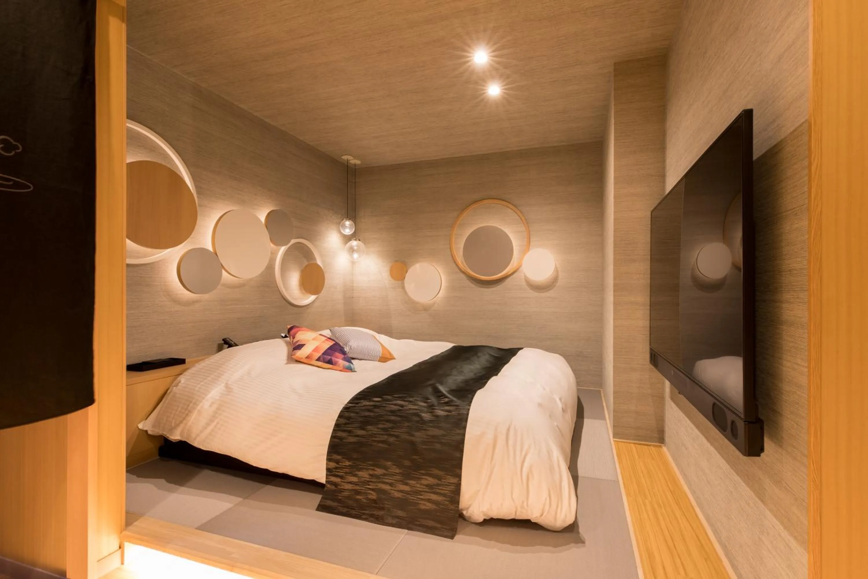 Bed in Yatomi Hotel Nuqu Natural Hot Spring