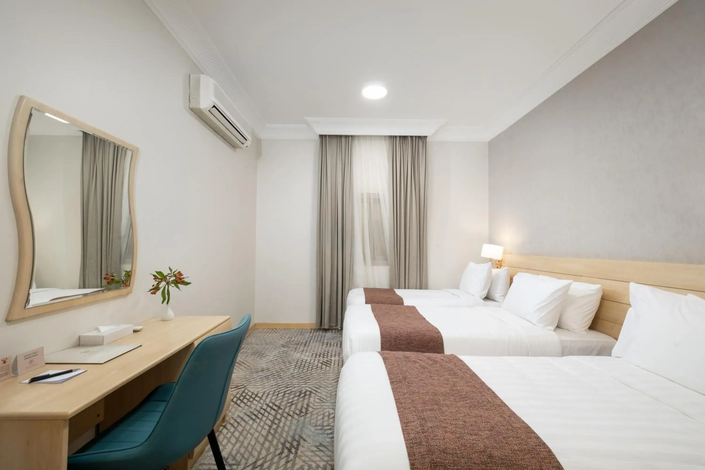 Standard Triple Room in Emaar Al Noor Standard Triple Room in Emaar Al Noor