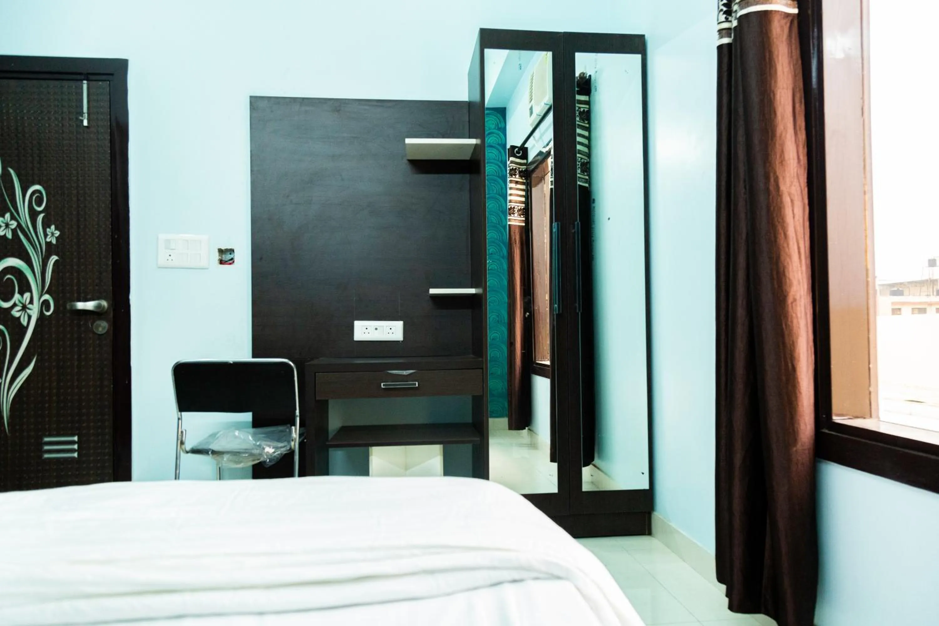 Bed in Jagdambey Hotel