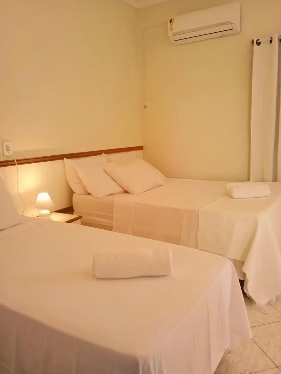 Bed in Pousada Aruamar