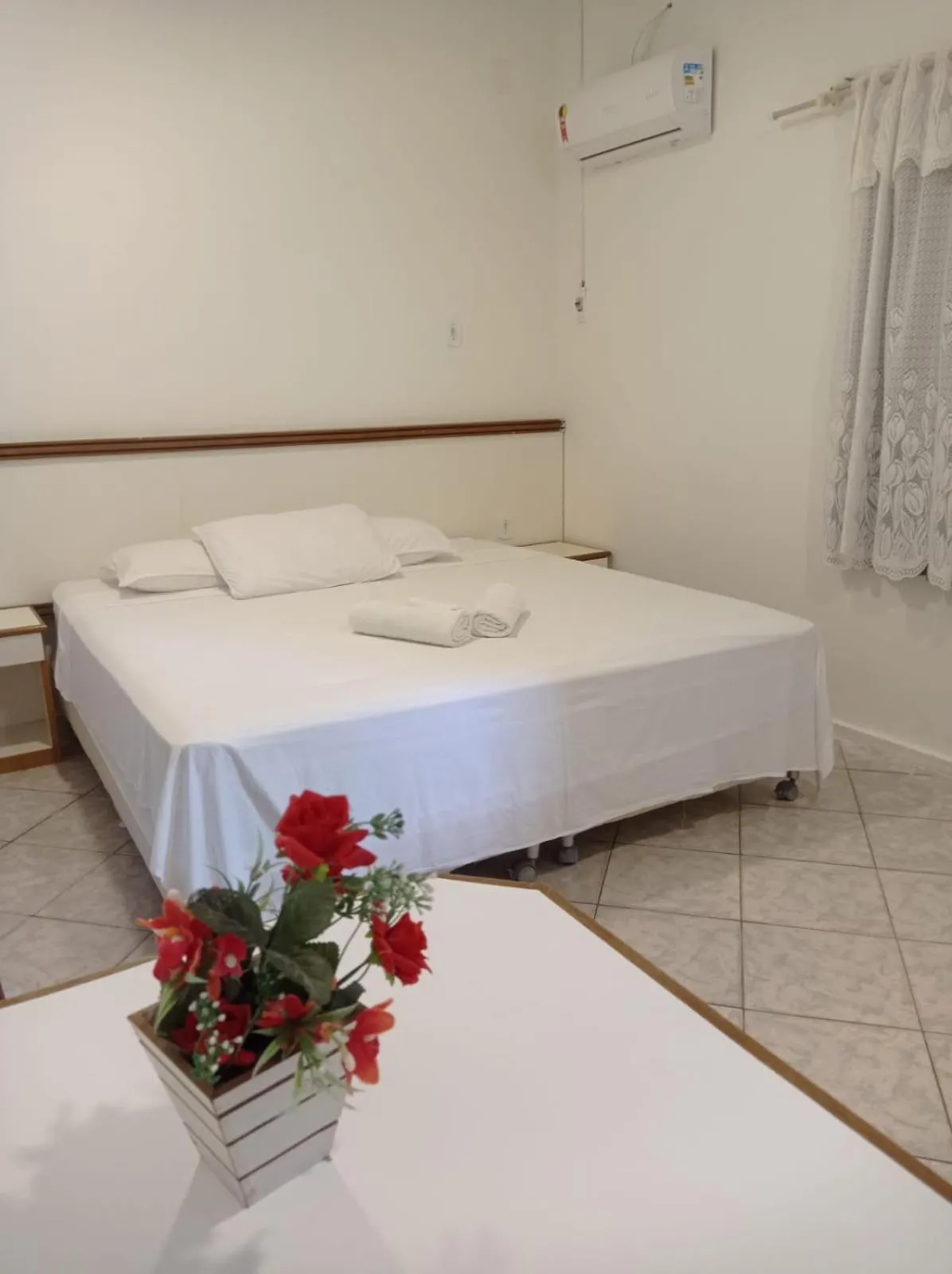 Bed in Pousada Aruamar