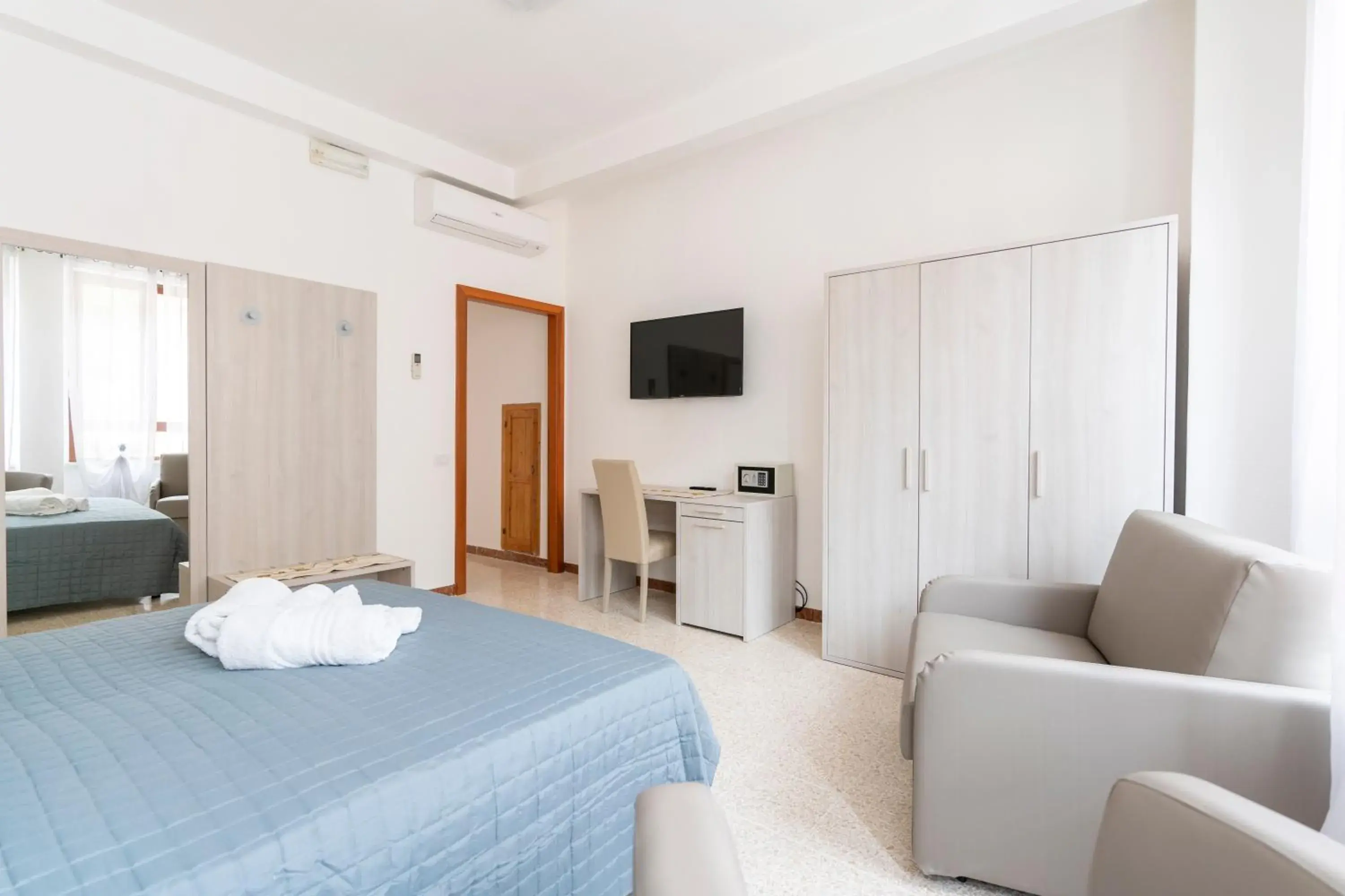 Deluxe Room (2 Adults + 1 Child) - single occupancy in Hotel dei Tacchi Deluxe Room (2 Adults + 1 Child) - single occupancy in Hotel dei Tacchi