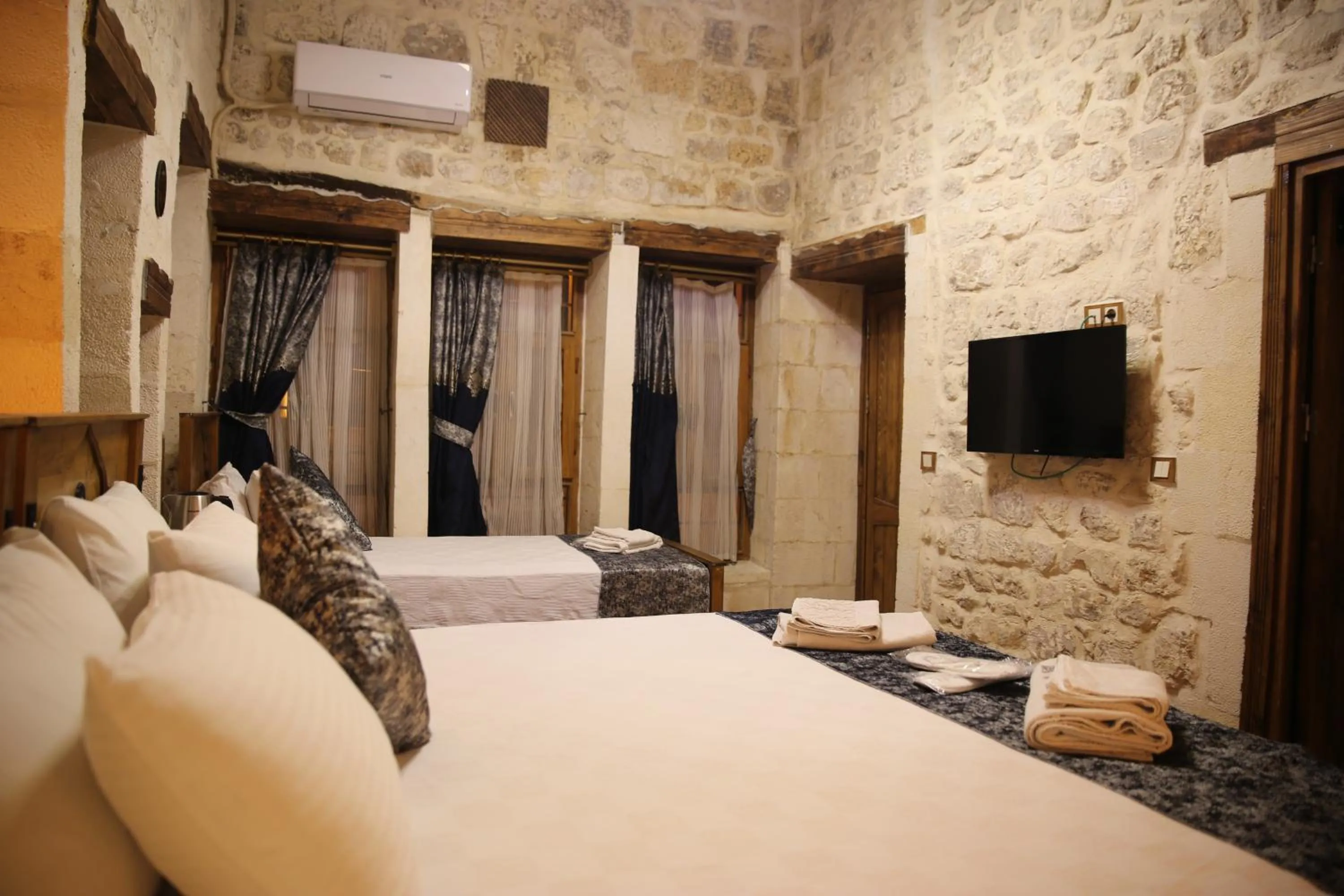 Bed in BABIL ANTIQUE HOTEL