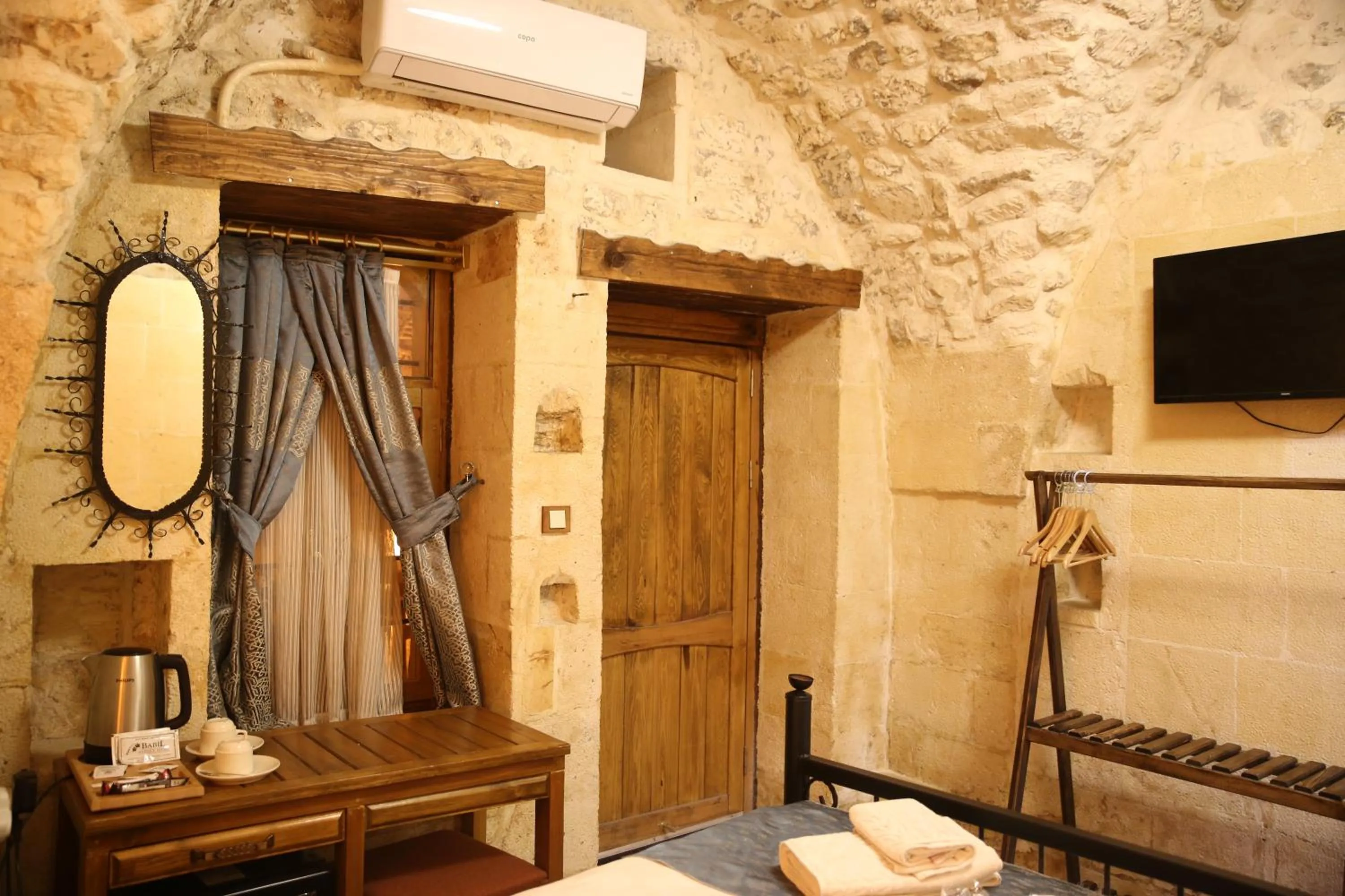 Bed in BABIL ANTIQUE HOTEL