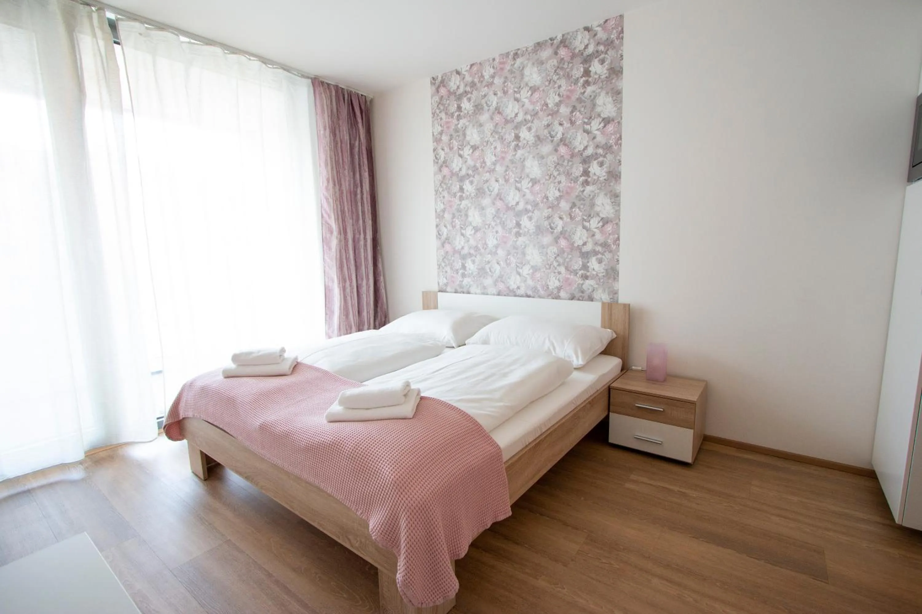 Bed in Kora Apartments