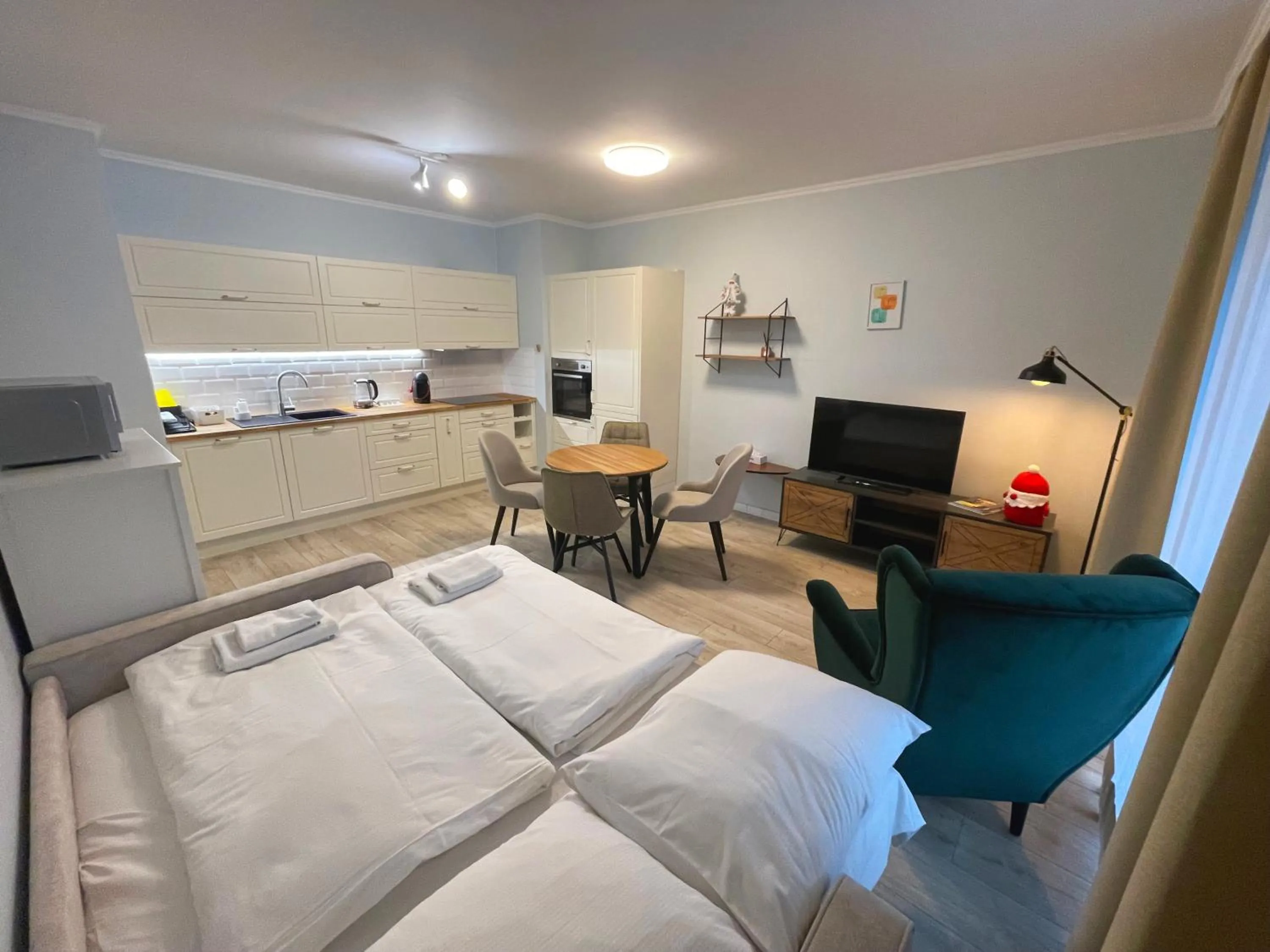 Living room, Bed in Kora Apartments