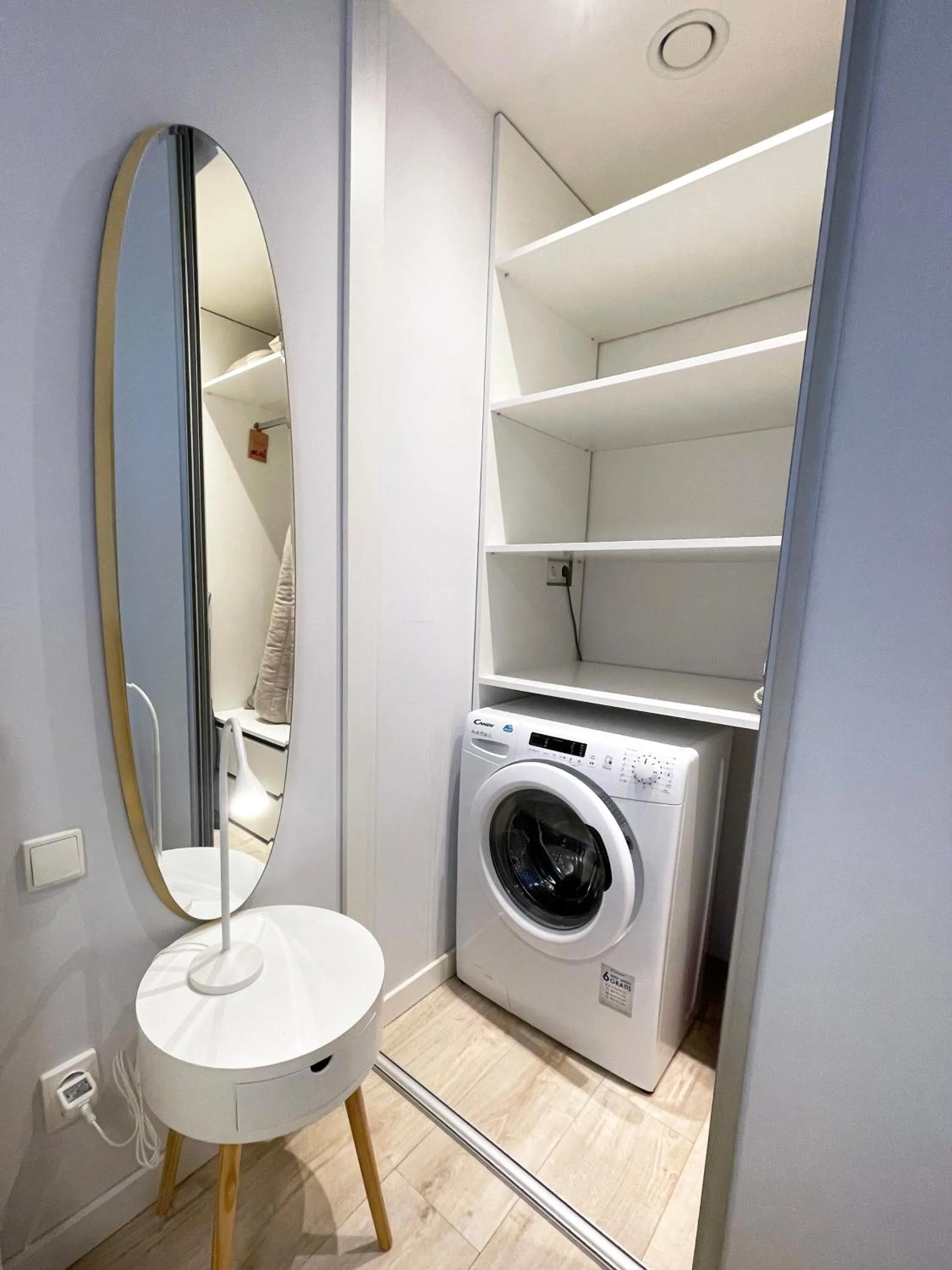 washing machine in Kora Apartments