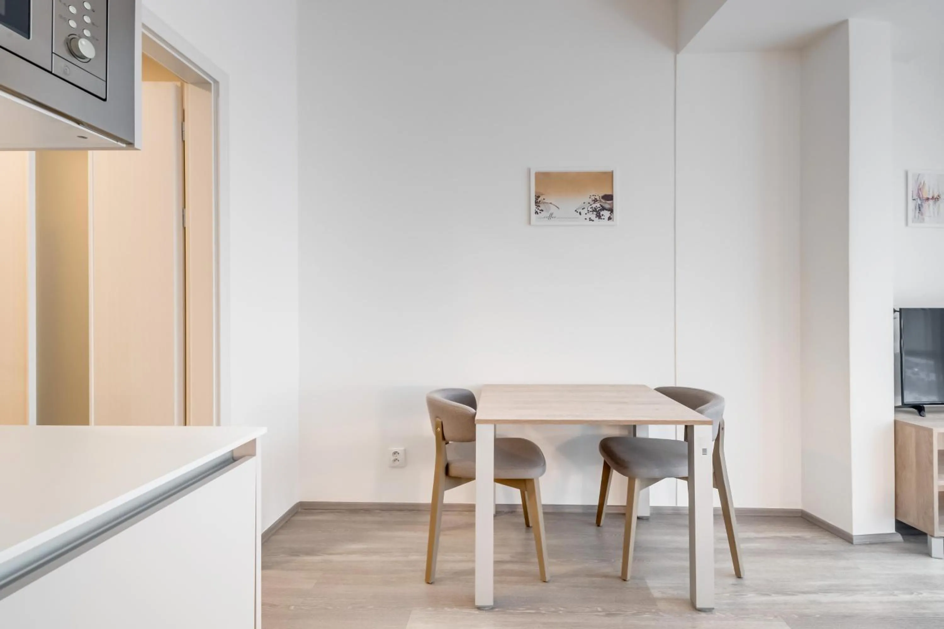 Dining area in Kora Apartments