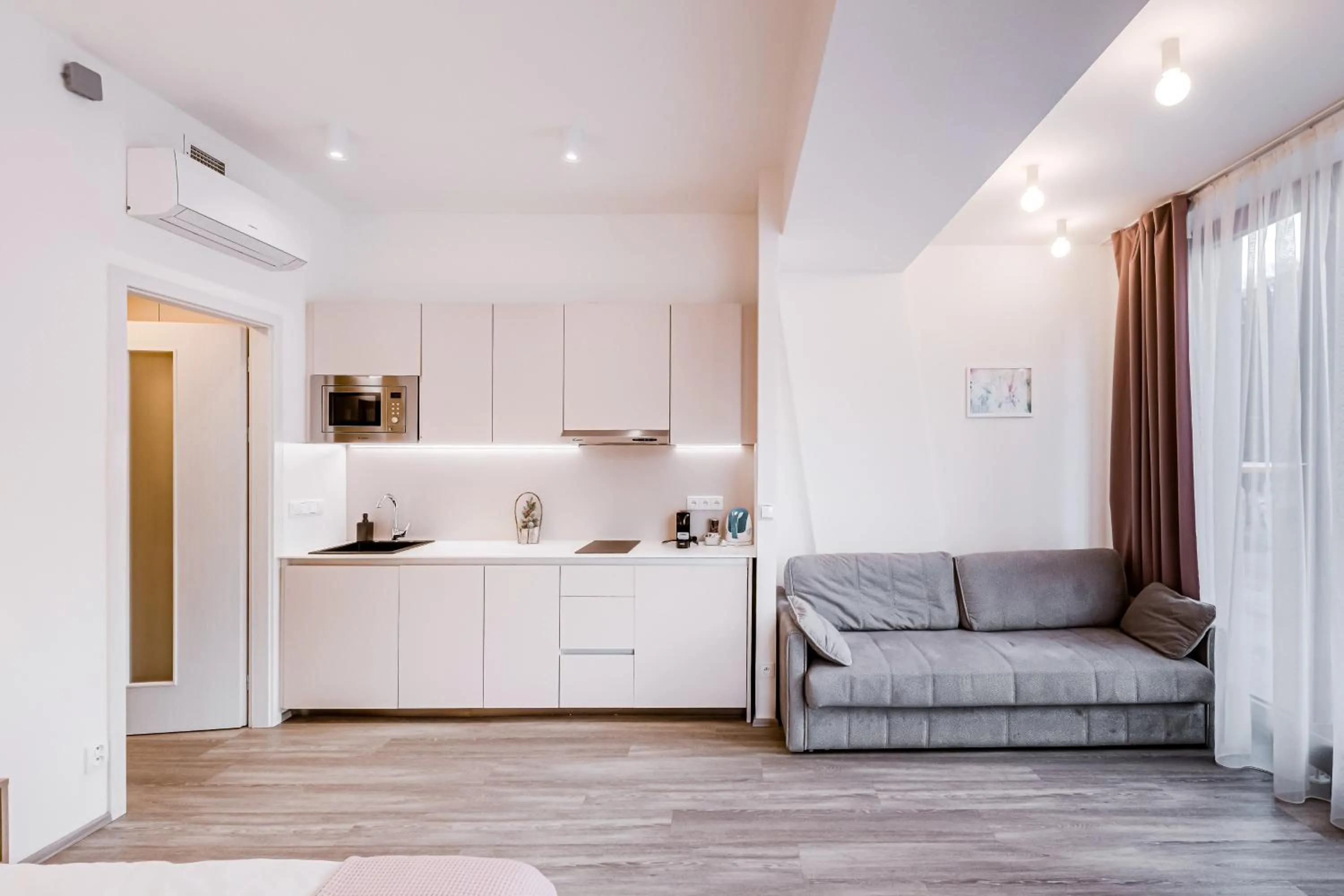 Kitchen or kitchenette in Kora Apartments
