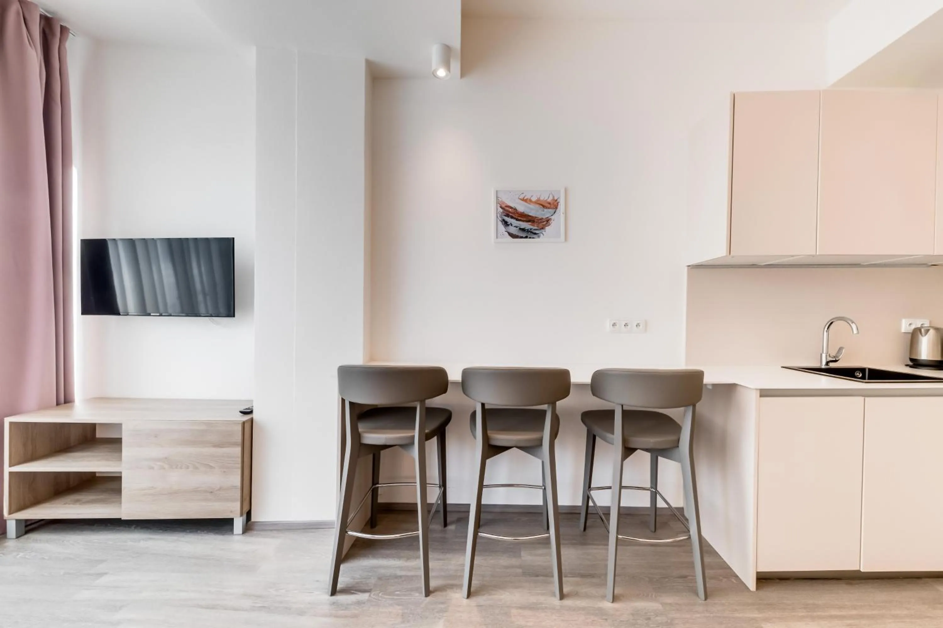 Kitchen or kitchenette in Kora Apartments
