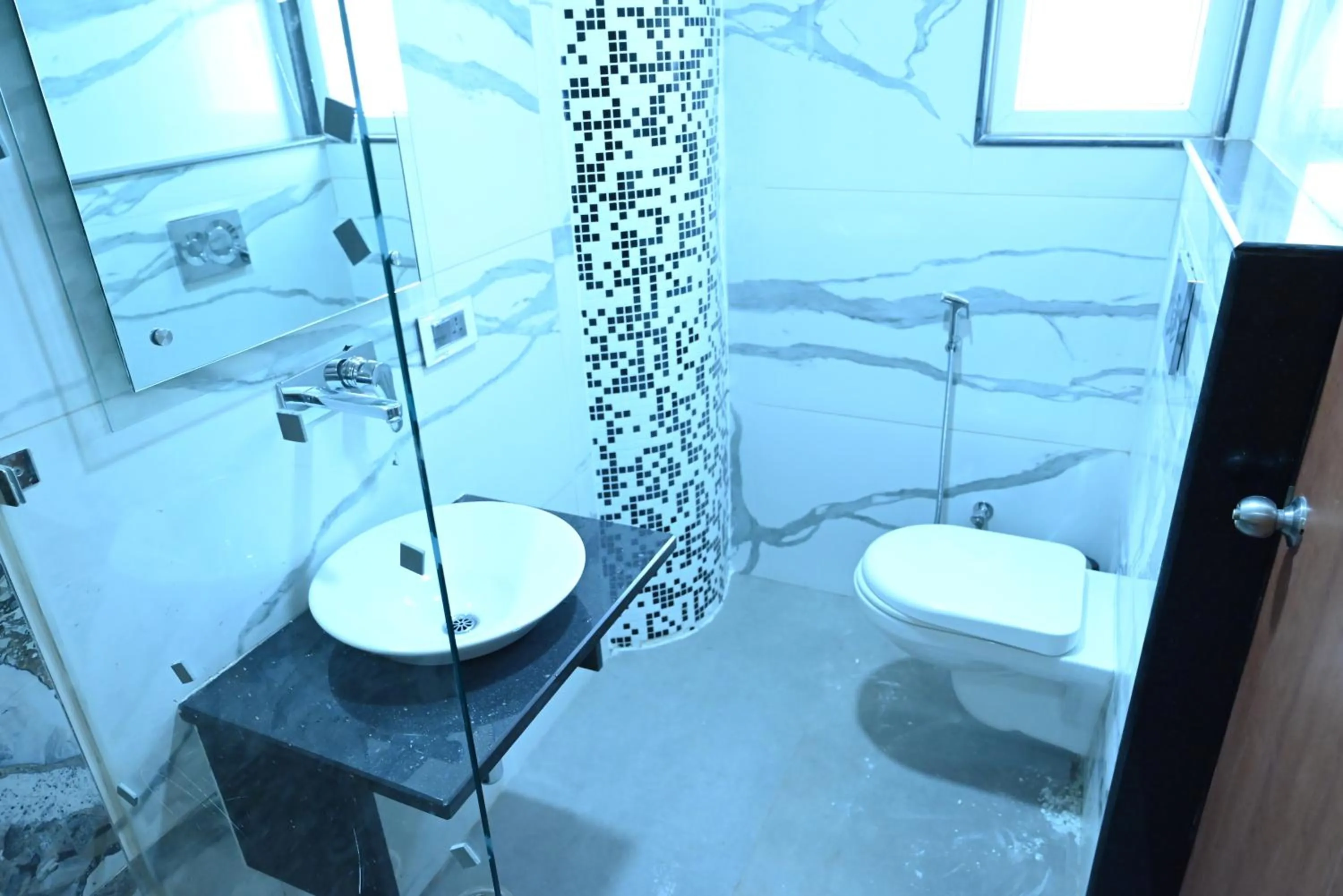 Bathroom in THE TRIUMPH Hotel