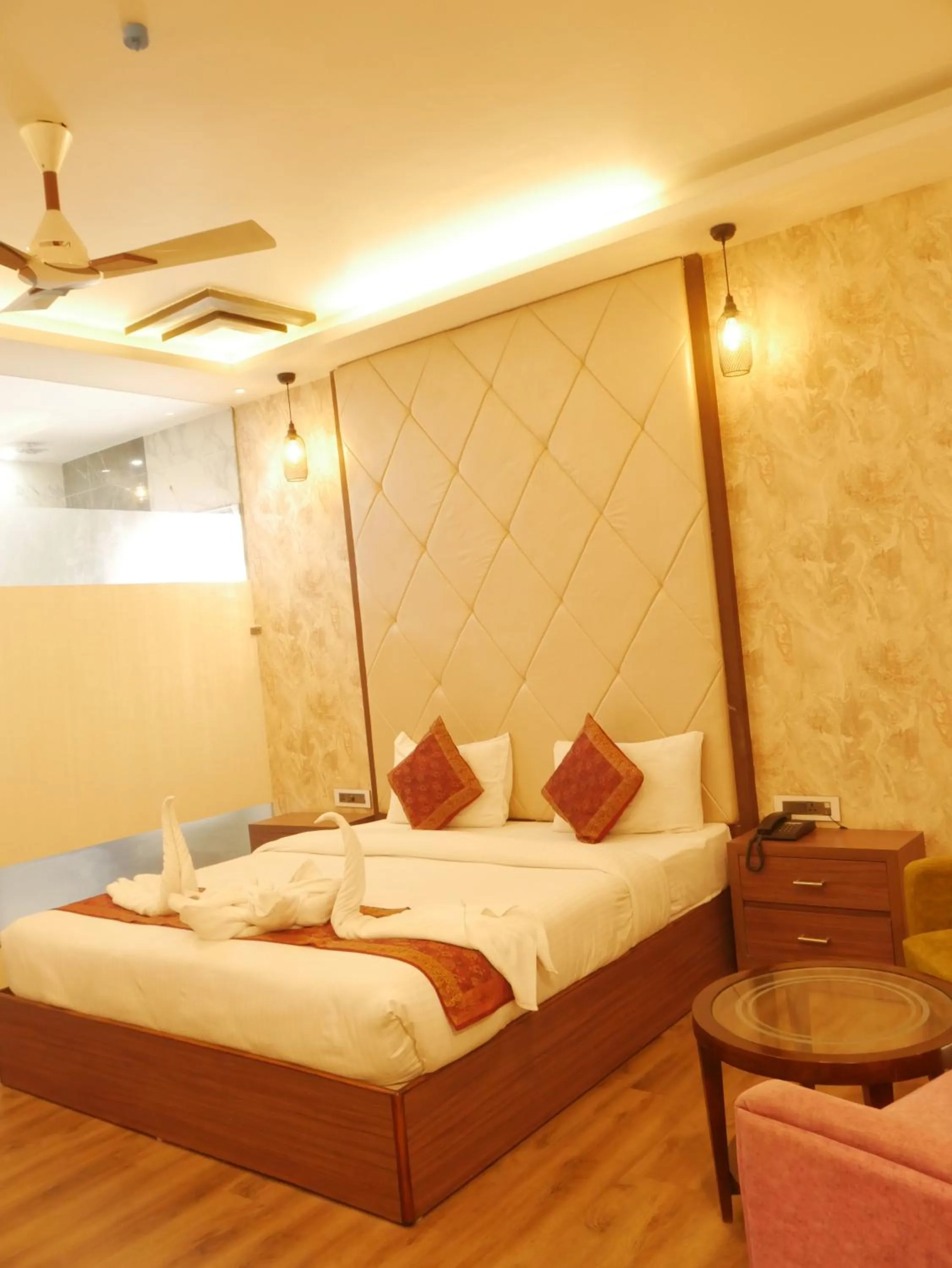 Bedroom in THE TRIUMPH HOTEL