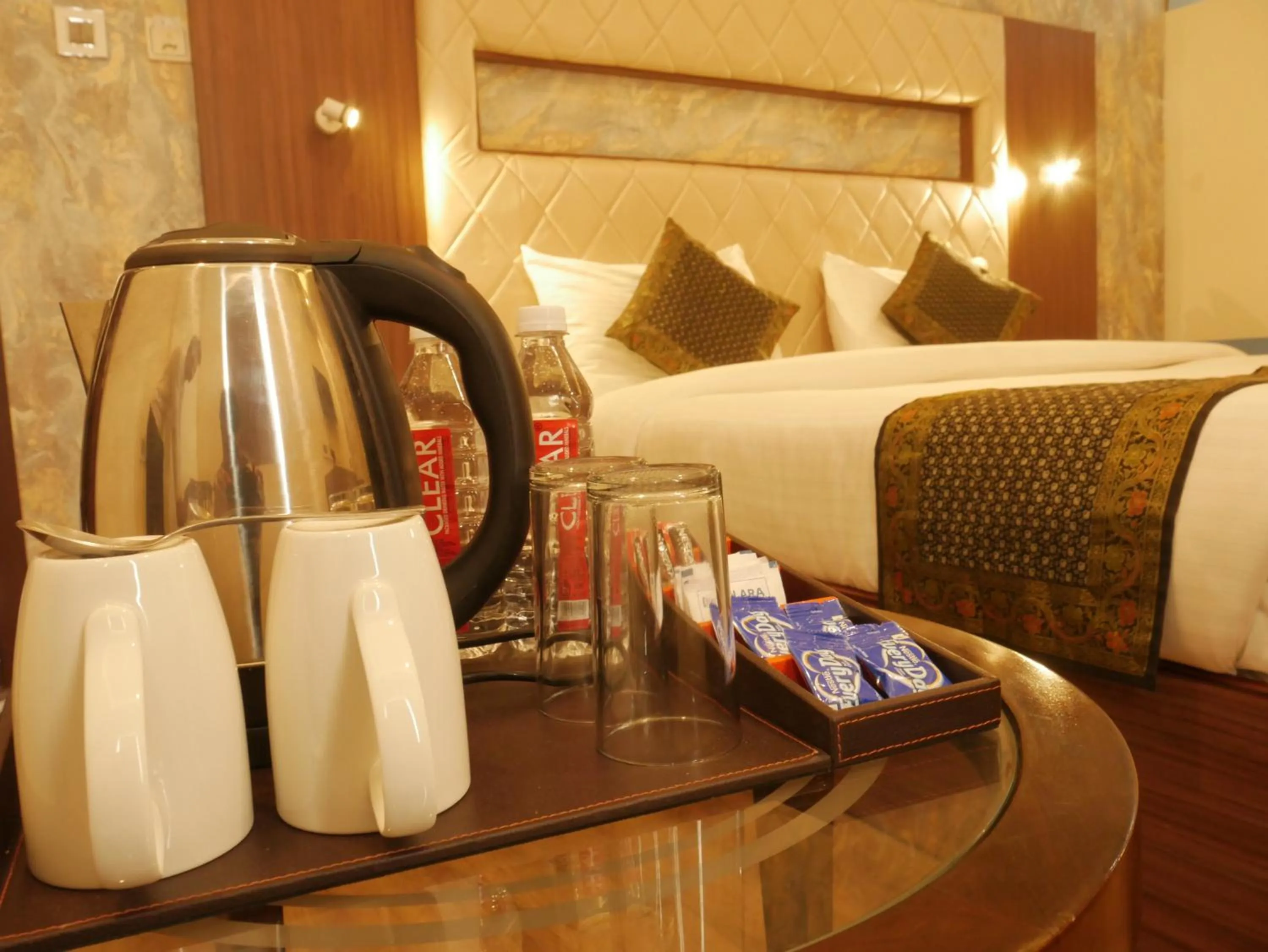 Coffee/tea facilities, Bed in THE TRIUMPH Hotel