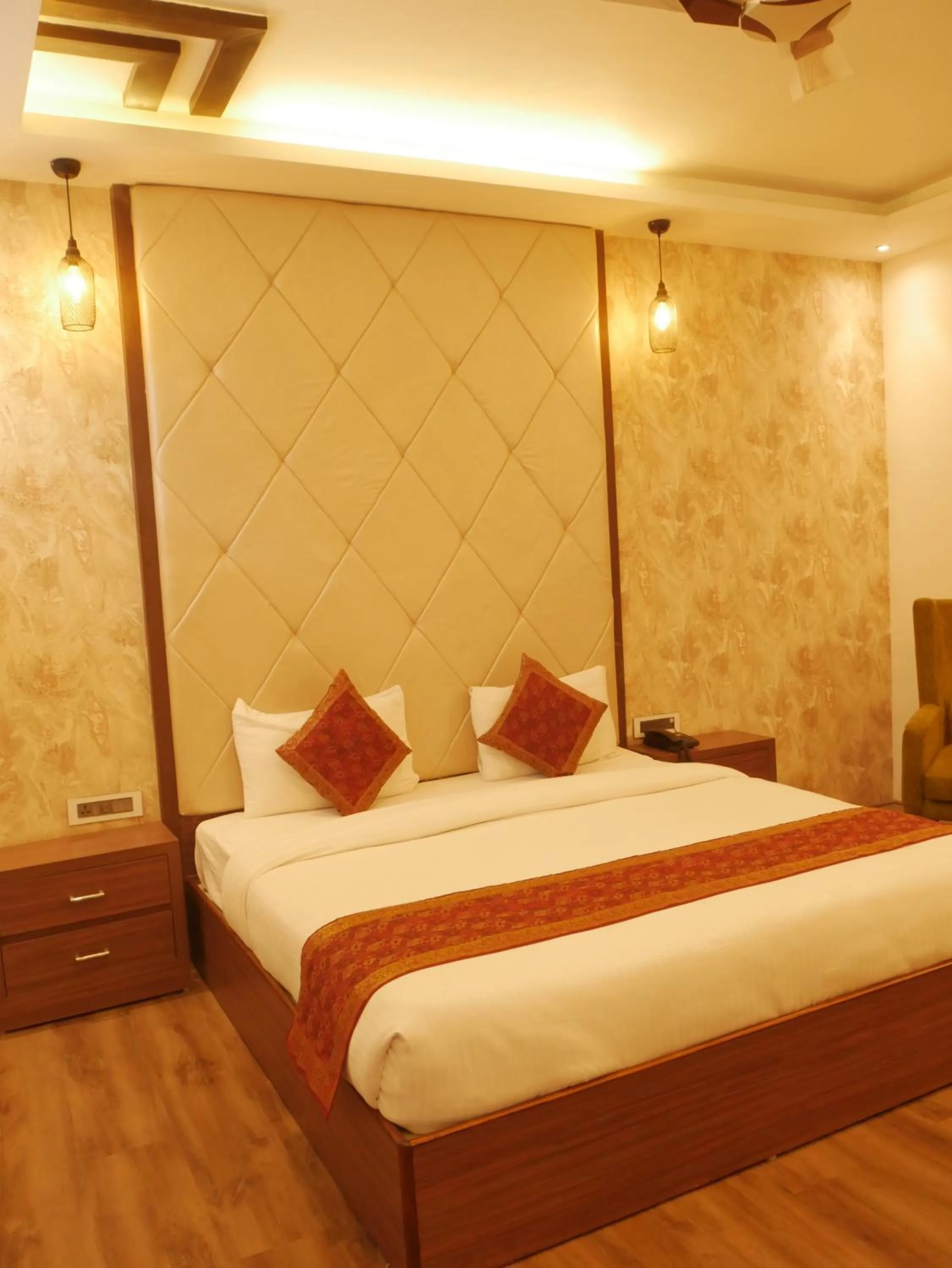 Bedroom in THE TRIUMPH HOTEL