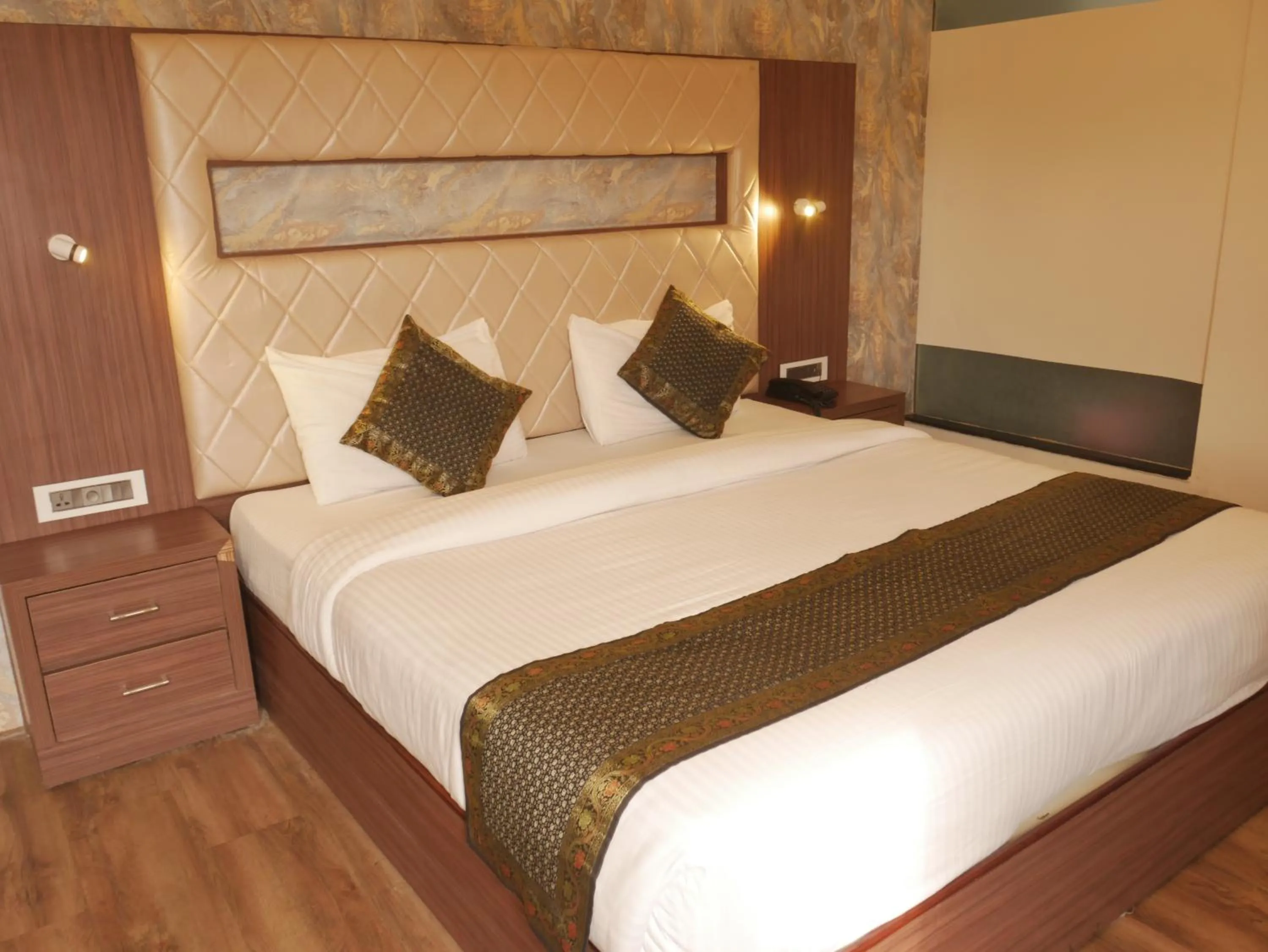 Bedroom in THE TRIUMPH HOTEL