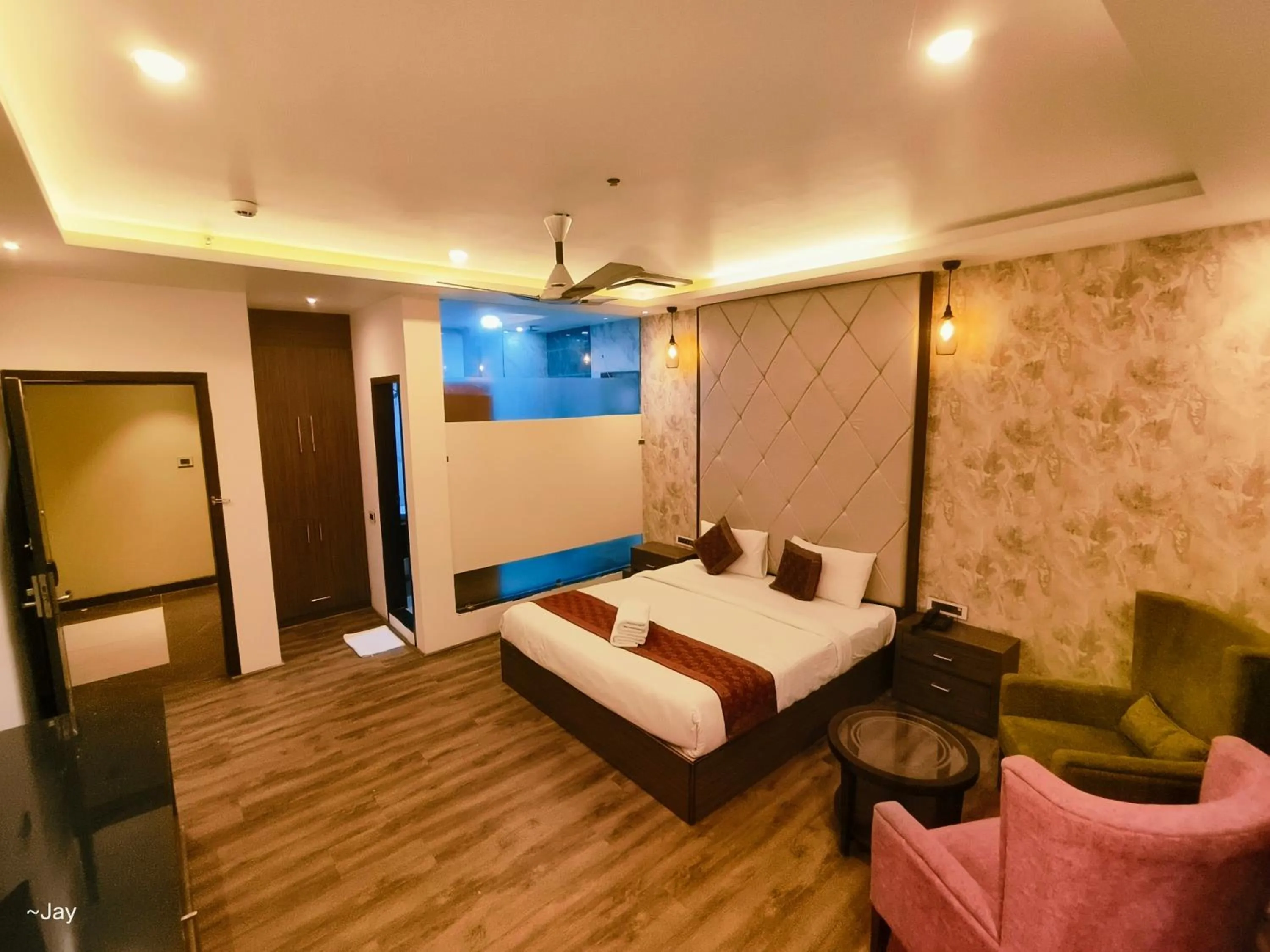 Bed in THE TRIUMPH Hotel