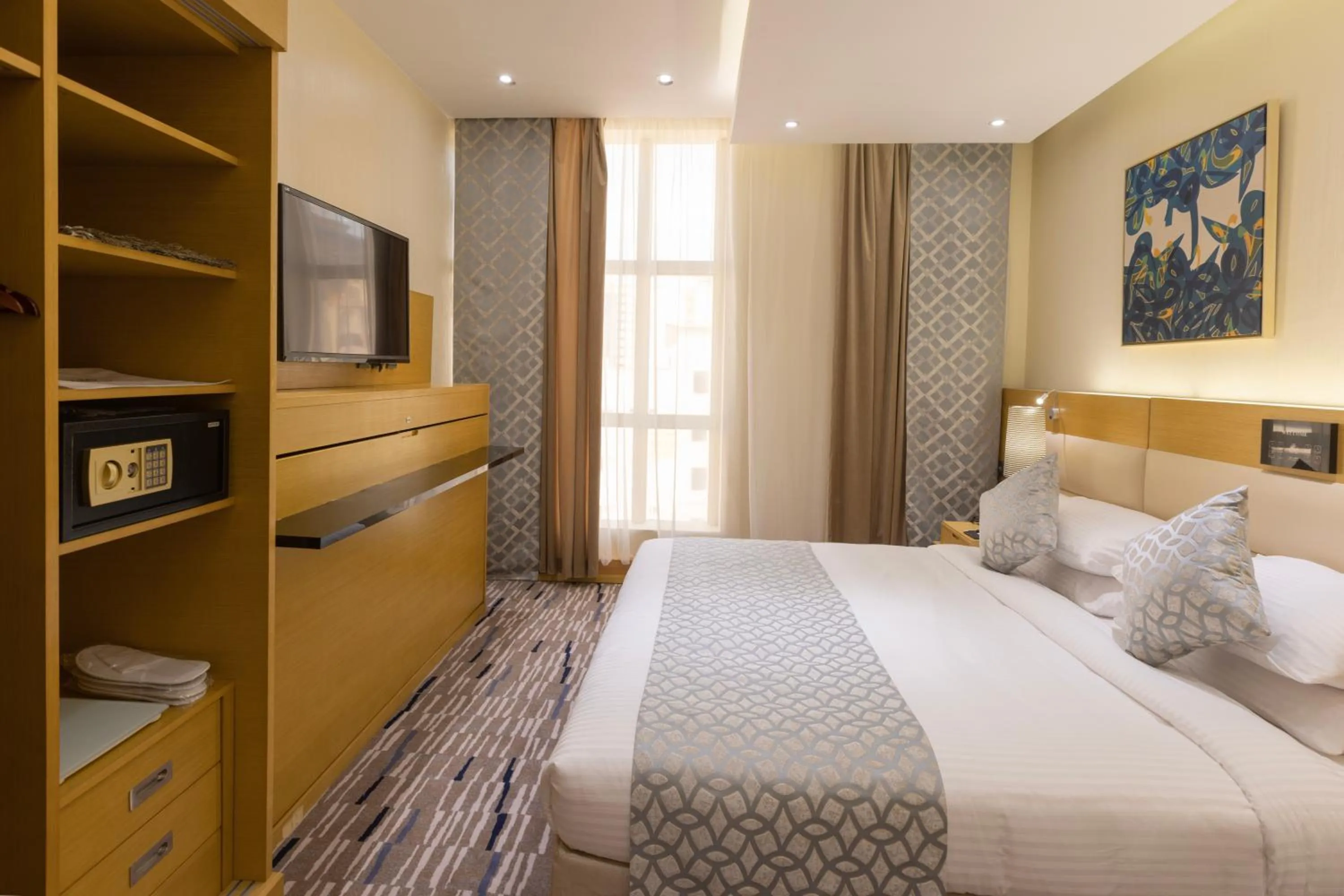 Bed in Qasr Al Sahab Hotel Makkah