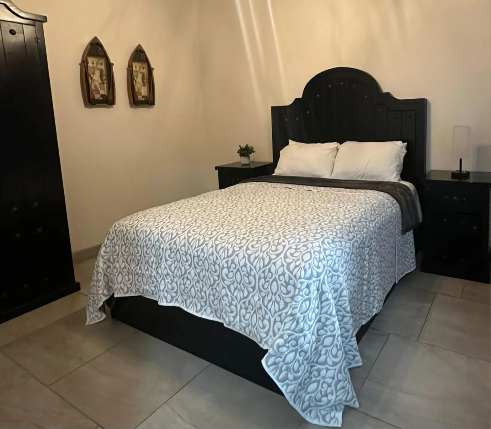 Bed in Playas Hotel Suites